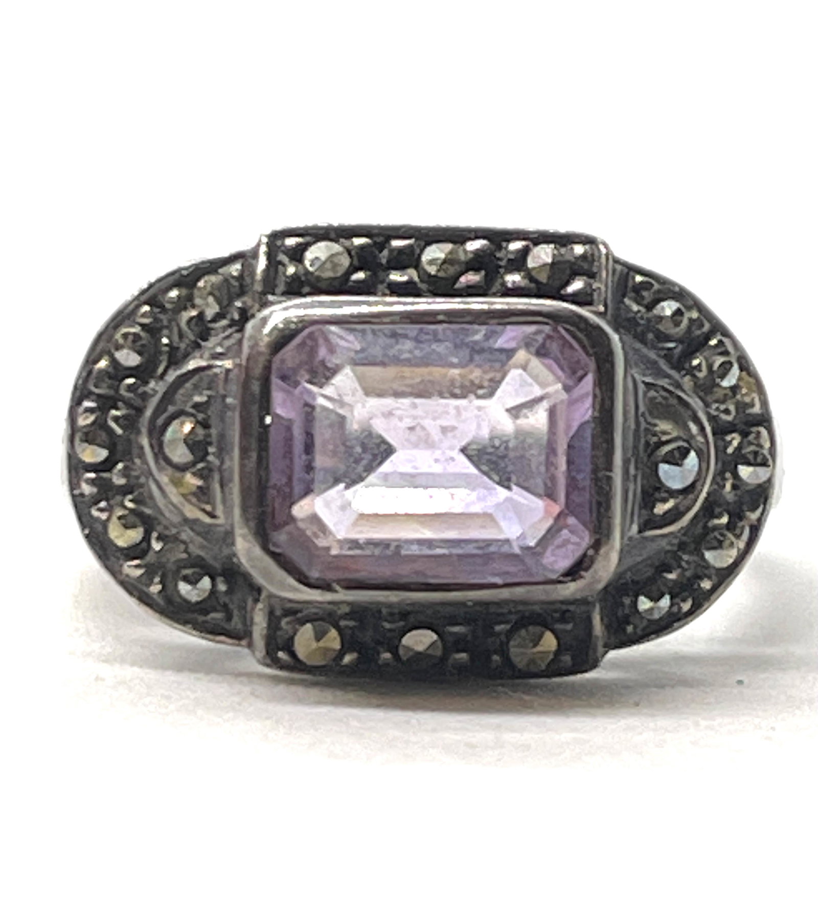 ART DECO STERLING UNCAS AMETHYST MARCASITE RING SZ 4.5: ART DECO STERLING UNCAS AMETHYST MARCASITE RING SZ 4.5. IN MINT OVERALL SHAPE AND CONDITION. HAS A GREAT LOOK TO IT WITH AN EXCELLENT OVERALL EYE APPEAL. A GREAT FIND AND AN EXCELLENT ADDITION TO YOUR