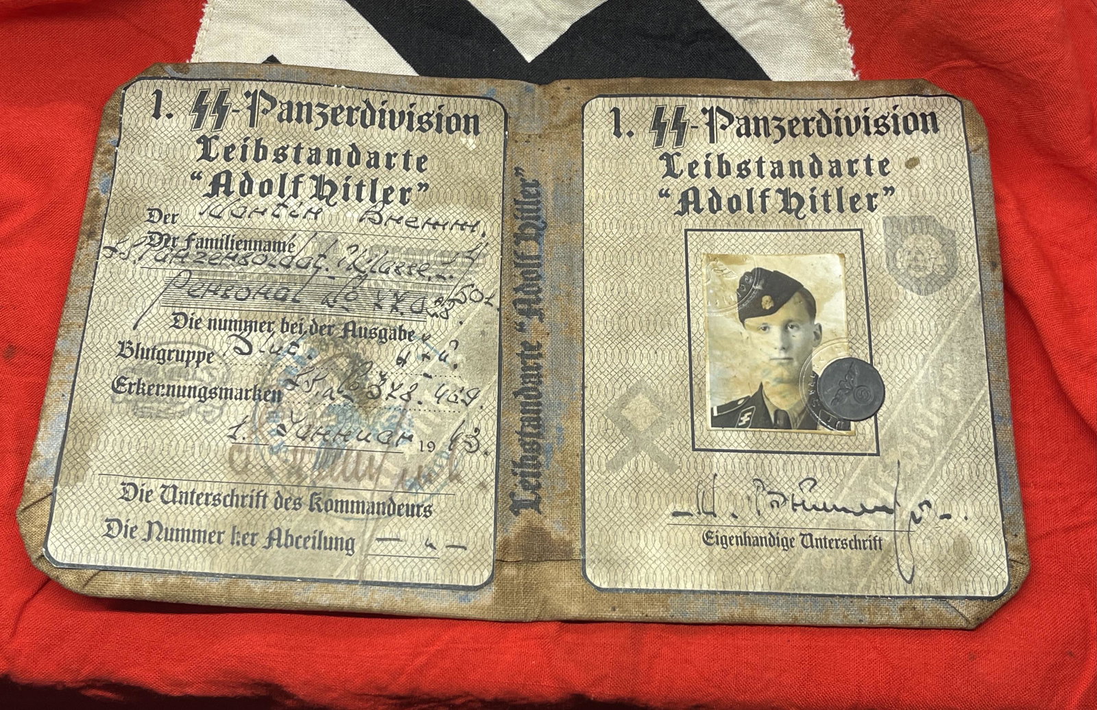 RARE WW2 GERMAN SS PANZER DIV. OFFICER ID/PASSPORT: RARE WW2 GERMAN SS PANZER DIV. OFFICER ID/PASSPORT. A VERY RARE FIND. IN MINT OVERALL SHAPE AND CONDITION WITH A BEAUTIFUL OVERALL PATINA. PLEASE VIEW ALL DETAILED PICTURES. A GREAT FIND AND AN EXCELL
