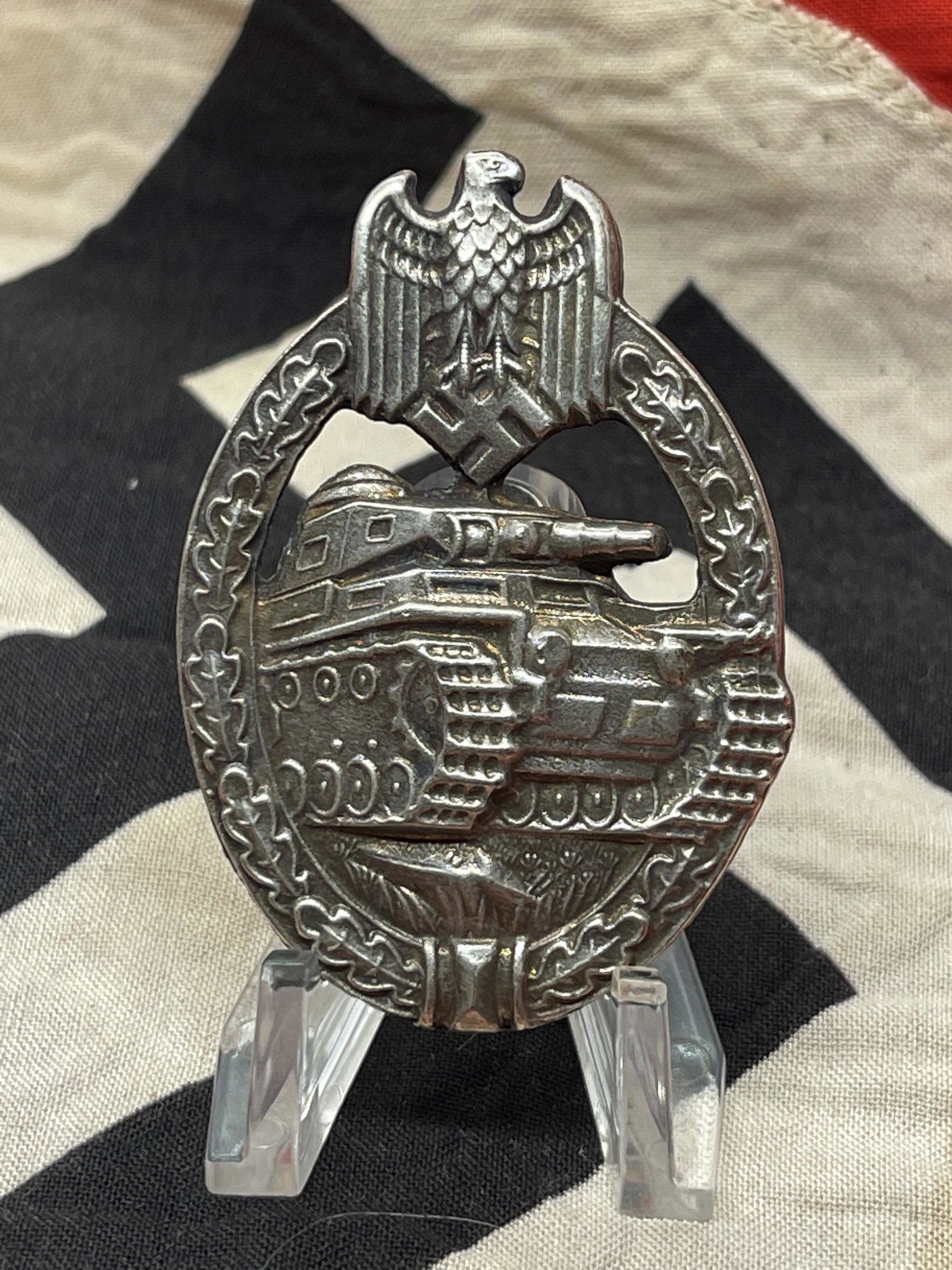 RARE WW2 GERMAN PANZER BADE W/RZM MARKS: RARE WW2 GERMAN PANZER BADE W/RZM MARKS. IN MINT OVERALL SHAPE AND CONDITION. HAS A GREAT LOOK TO IT WITH AN EXCELLENT OVERALL EYE APPEAL. A GREAT FIND AND AN EXCELLENT ADDITION TO YOUR COLLECTION.