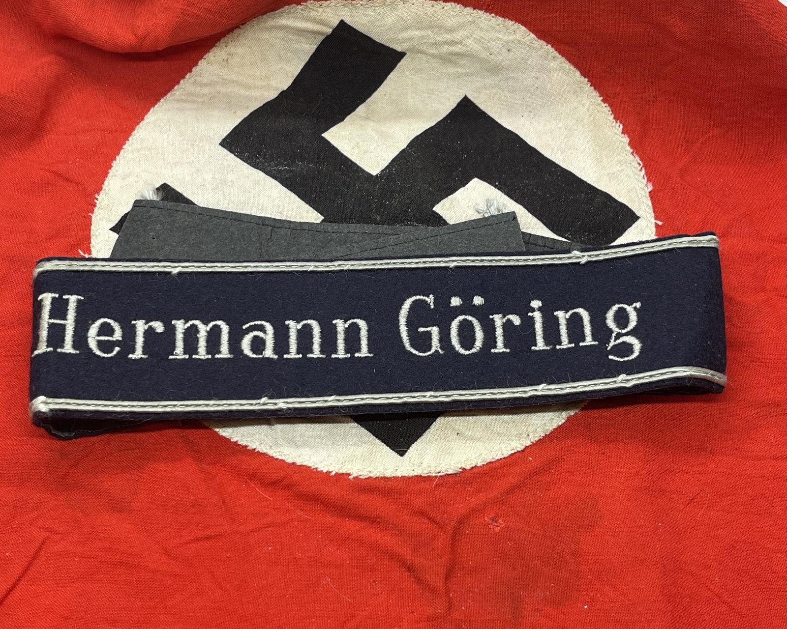 RARE WW2 GERMAN NAZI HERMANN GORING CUFF TITLE: RARE WW2 GERMAN NAZI HERMANN GORING CUFF TITLE. IN MINT OVERALL SHAPE AND CONDITION. HAS A GREAT LOOK TO IT WITH AN EXCELLENT OVERALL EYE APPEAL. A GREAT FIND AND AN EXCELLENT ADDITION TO YOUR COLLECT