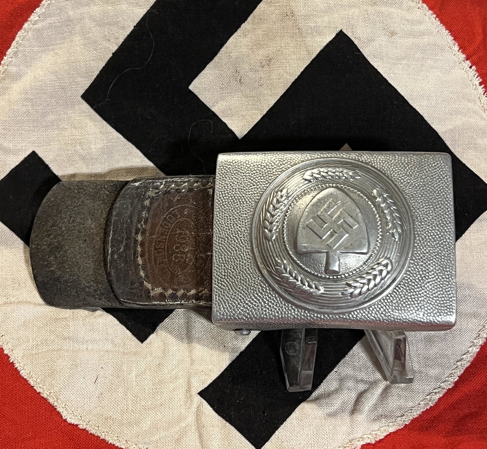 WW2 GERMAN NAZI LABOR CORPS BELT BUCKLE MARKED C.T.D.: WW2 GERMAN NAZI LABOR CORPS BELT BUCKLE MARKED C.T.D. 1938. IN MINT OVERALL SHAPE AND CONDITION. HAS A GREAT LOOK TO IT WITH AN EXCELLENT OVERALL EYE APPEAL. PLEASE VIEW ALL DETAILED PICTURES. A GREAT