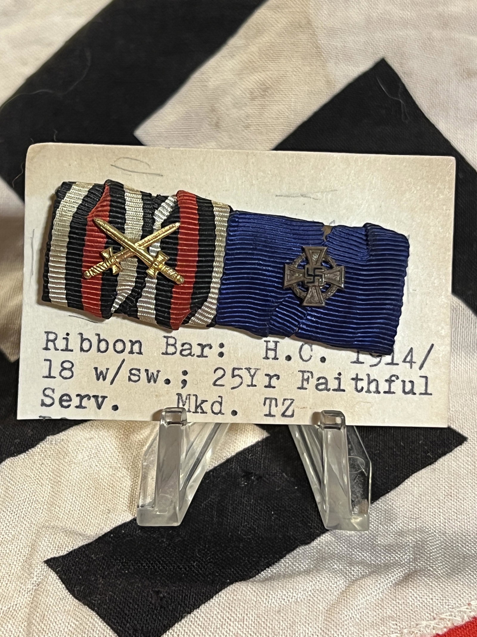 WW2 GERMAN 1914 25 YR FAITHFUL SERVICE RIBBON BAR: WW2 GERMAN 1914 25 YR FAITHFUL SERVICE RIBBON BAR. A RARE FIND. IN MINT OVERALL SHAPE AND CONDITION. HAS A GREAT LOOK TO IT WITH AN EXCELLENT OVERALL EYE APPEAL. A GREAT FIND AND AN EXCELLENT ADDITION