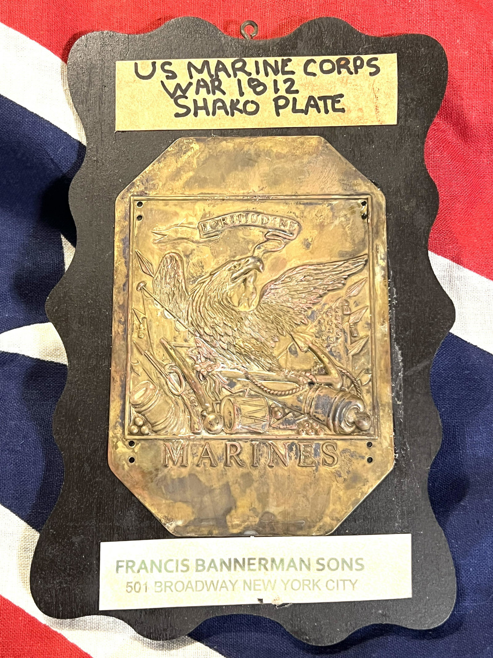RARE WAR OF 1812 U.S. MARINE CORPS SHAKO PLATE: RARE WAR OF 1812 U.S. MARINE CORPS SHAKO PLATE. IN MINT OVERALL SHAPE AND CONDITION. MOUNTED ON A WOODEN PLANK. PLEASE VIEW ALL DETAILED PICTURES. A GREAT FIND AND AN EXCELLENT ADDITION TO YOUR COLLEC