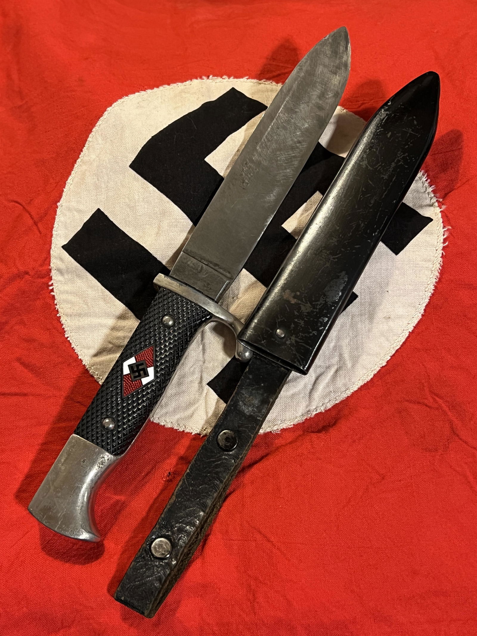 WW2 GERMAN HITLER YOUTH KNIFE BY GRAFRATH SOLINGEN RZM: WW2 GERMAN HITLER YOUTH KNIFE BY GRAFRATH SOLINGEN RZM M7/30 1936. THIS IS A COMPLETE SET. COMES WITH THE ORIGINAL SCABBARD. HAS A GREAT LOOK TO IT WITH AN EXCELLENT OVERALL EYE APPEAL. PLEASE VIEW AL