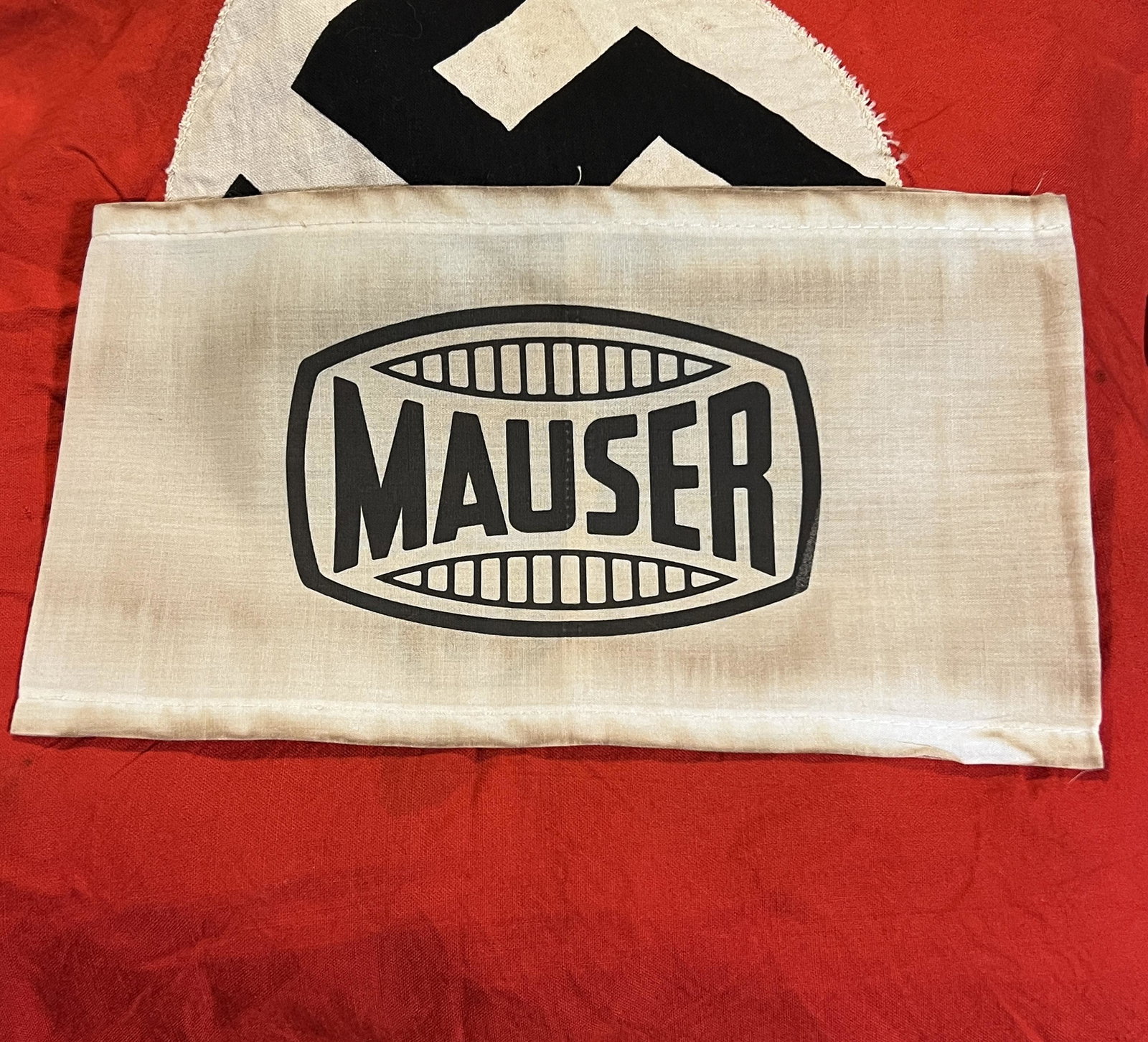 RARE WW2 GERMAN NAZI MAUSER ARMBAND W/STAMP: RARE WW2 GERMAN NAZI MAUSER ARMBAND W/STAMP. IN MINT OVERALL SHAPE AND CONDITION WITH A BEAUTIFUL OVERALL PATINA. HAS A GREAT LOOK TO IT WITH AN EXCELLENT OVERALL EYE APPEAL. PLEASE VIEW ALL DETAILED 