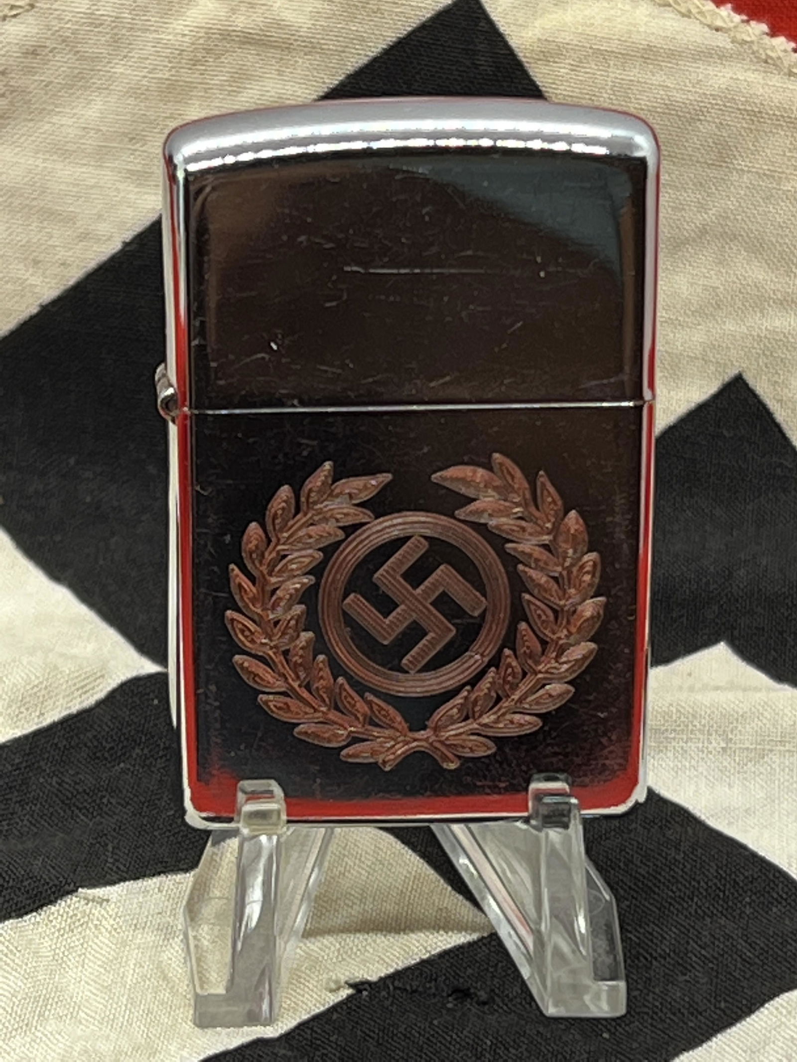 WW2 GERMAN NAZI SOLDIER ZIPPO TYPE LIGHTER: WW2 GERMAN NAZI SOLDIER ZIPPO TYPE LIGHTER. IN MINT OVERALL SHAPE AND CONDITION. A GREAT FIND AND AN EXCELLENT ADDITION TO YOUR COLLECTION.