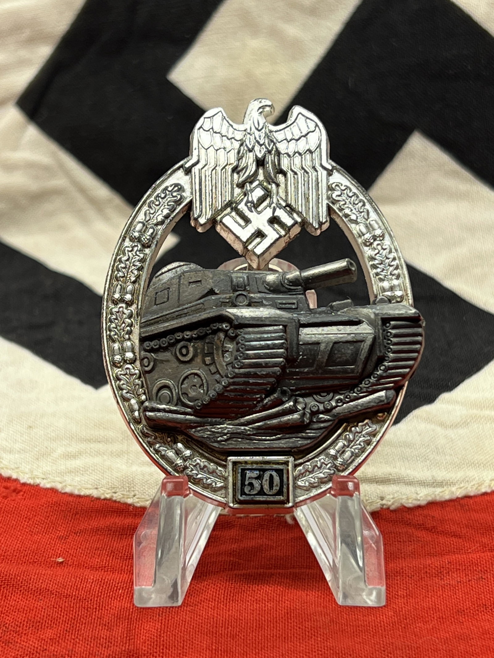 WW2 GRMAN PANZER TANK ASSAULT BADGE 50 ENGAGEMENTS JFS: WW2 GRMAN PANZER TANK ASSAULT BADGE 50 ENGAGEMENTS JFS MAKER MARKED. IN MINT OVERALL SHAPE AND CONDITION WITH A BEAUTIFUL OVERALL PATINA. A GREAT FIND AND AN EXCELLENT ADDITION TO YOUR COLLECTION.