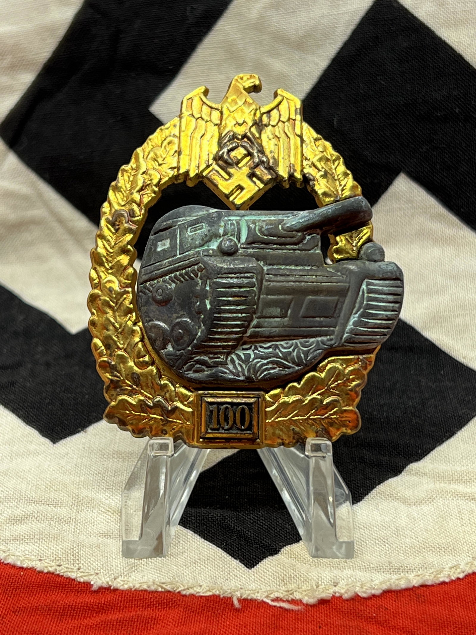WW2 GERMAN PANZER TANK ASSAULT BADGE 100 ENGAGMENTS: WW2 GERMAN PANZER TANK ASSAULT BADGE 100 ENGAGMENTS - JFS MAKER MARKED. IN MINT OVERALL SHAPE AND CONDITION WITH A BEAUTIFUL OVERALL PATINA. HAS A GREAT LOOK TO IT WITH AN EXCELLENT OVERALL EYE APPEAL
