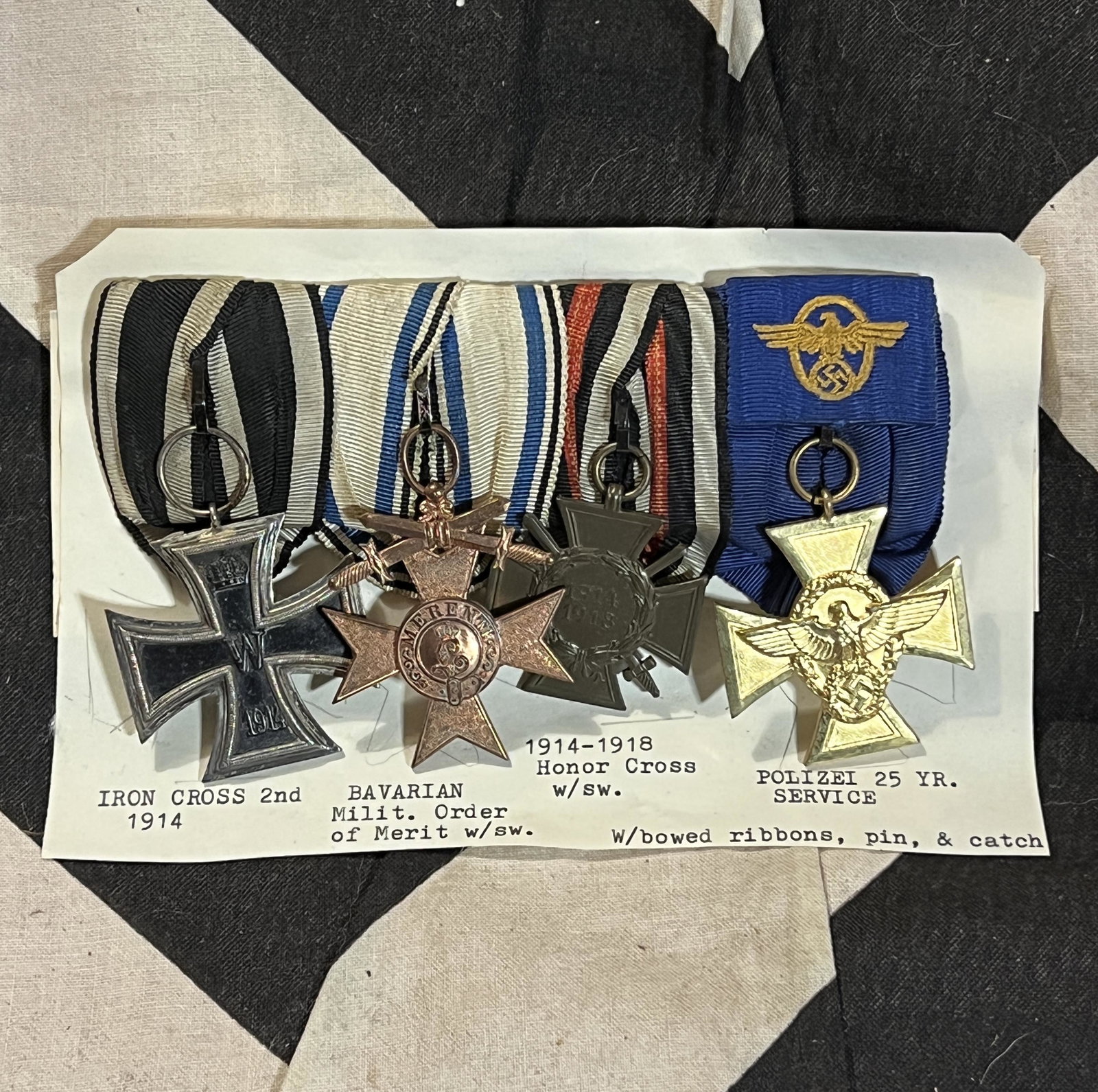 WW2 GERMAN SET OF (4) MEDALS ON A BAR W/PIN & CATCH: WW2 GERMAN SET OF (4) MEDALS ON A BAR W/PIN & CATCH. A RARE FIND. IT IS IN MINT OVERALL SHAPE AND CONDITION WITH A BEAUTIFUL OVERALL PATINA. THESE WERE BROUGHT BACK HOME BY A VET. INCLUDED IN THIS BAR