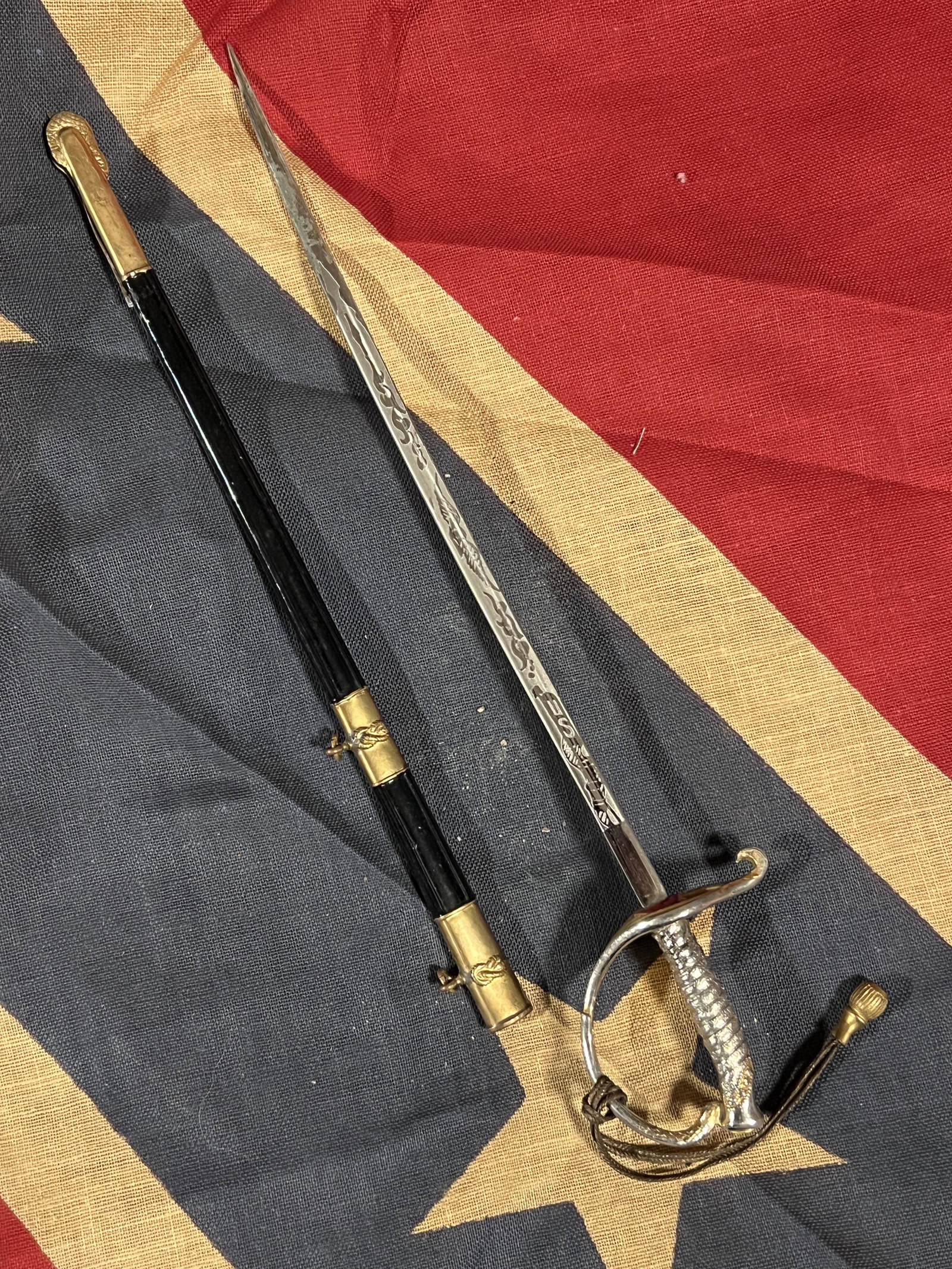RARE WW2 U.S. OFFICER MINIATURE SWORD LETTER OPENER: RARE WW2 U.S. OFFICER MINIATURE SWORD LETTER OPENER. A RARE FIND. IT IS IN MINT OVERALL SHAPE AND CONDITION. BEAUTIFUL ETCHED BLADE. LOOKS LIKE THE REAL DEAL IN A MINIATURE FORM. A GREAT FIND AND AN E