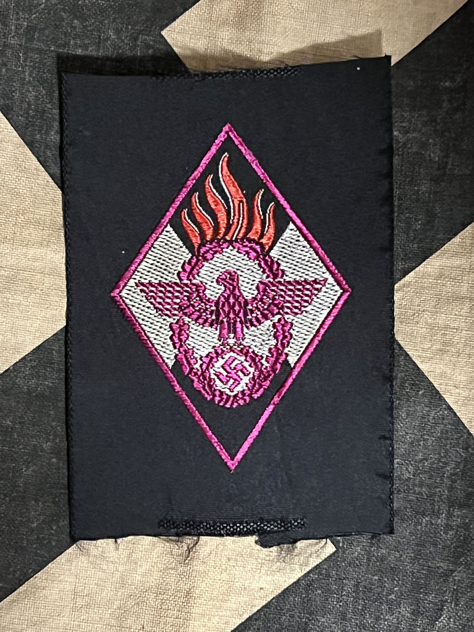 WW2 GERMAN HJ HITLER YOUTH FIRE DEFENSE SLEEVE BADGE: WW2 GERMAN HJ HITLER YOUTH FIRE DEFENSE SLEEVE BADGE. WAS BROUGHT BACK HOME BY A VET. IT IS IN MINT OVERALL SHAPE AND CONDITION WITH A BEAUTIFUL OVERALL PATINA. A GREAT FIND AND AN EXCELLENT ADDITION