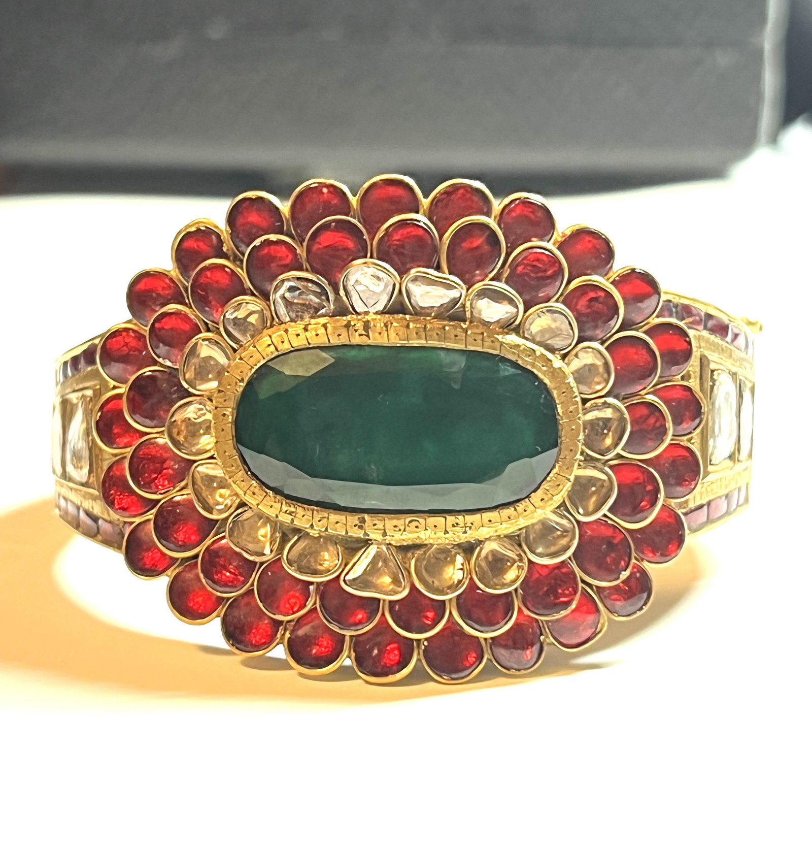 20K GOLD 40 TCW DIAMONDS RUBY EMERALD BRACELET: ANTIQUE 20K GOLD 40 TCW DIAMONDS RUBY EMERALD BRACELET. BRACELET WEIGHS 41.40 DWT. THIS IS A BEAUTIFUL FULLY ENGRAVED 22K SOLID GOLD BRACELET THAT IS LOADED WITH APPROX. 40 TCW OF RUBIES, DIAMONDS, AN