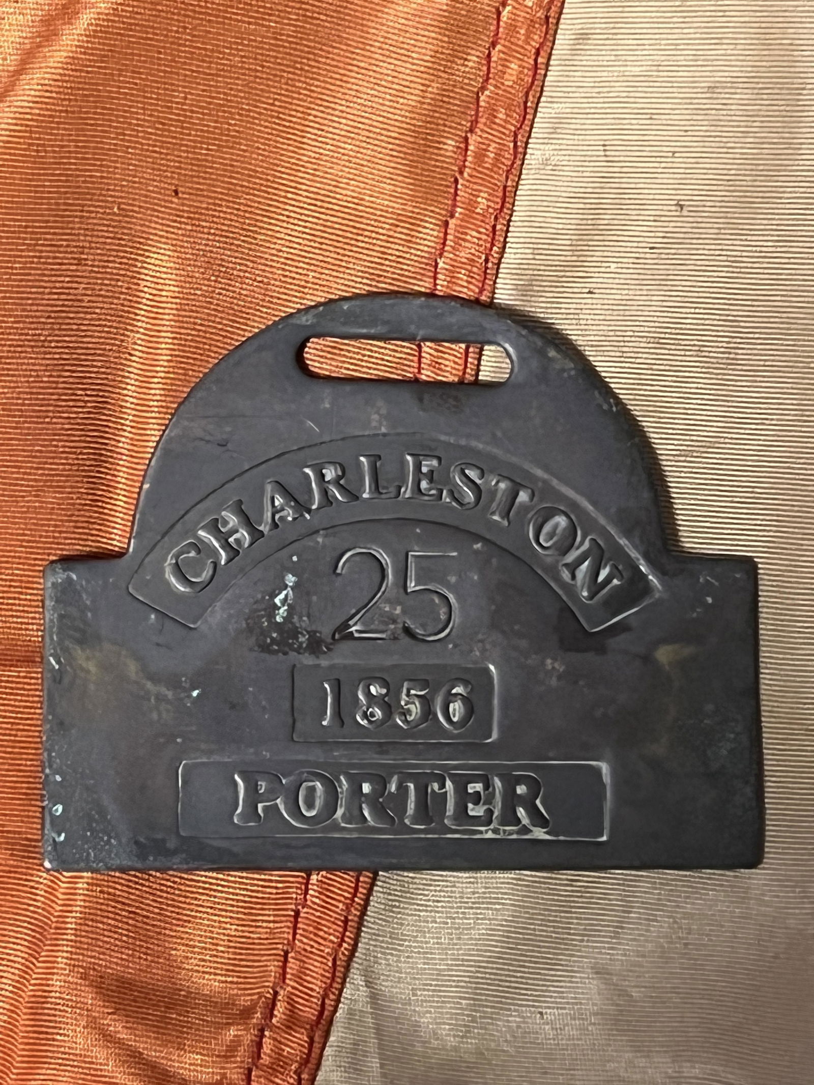 PORTER DATED 1856 CHARLESTON SERVANT SLAVE TAG: PORTER DATED 1856 CHARLESTON SERVANT SLAVE TAG. IN GOOD OVERALL SHAPE AND CONDITION WITH A NEAT PATINA THROUGHOUT. PLEASE VIEW ALL DETAILED PICTURES. A GREAT FIND AND AN EXCELLENT ADDITION TO YOUR COL