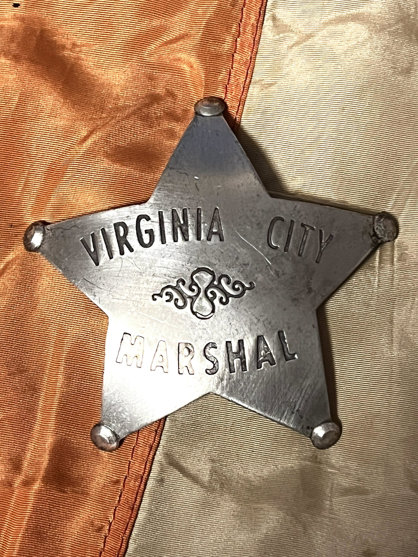 ANTIQUE VIRGINIA CITY MARSHAL BADGE: ANTIQUE VIRGINIA CITY MARSHAL BADGE. A RARE FIND. IT IS IN MINT OVERALL SHAPE AND CONDITION WITH A BEAUTIFUL OVERALL PATINA. A GREAT FIND AND AN EXCELLENT ADDITION TO YOUR COLLECTION.