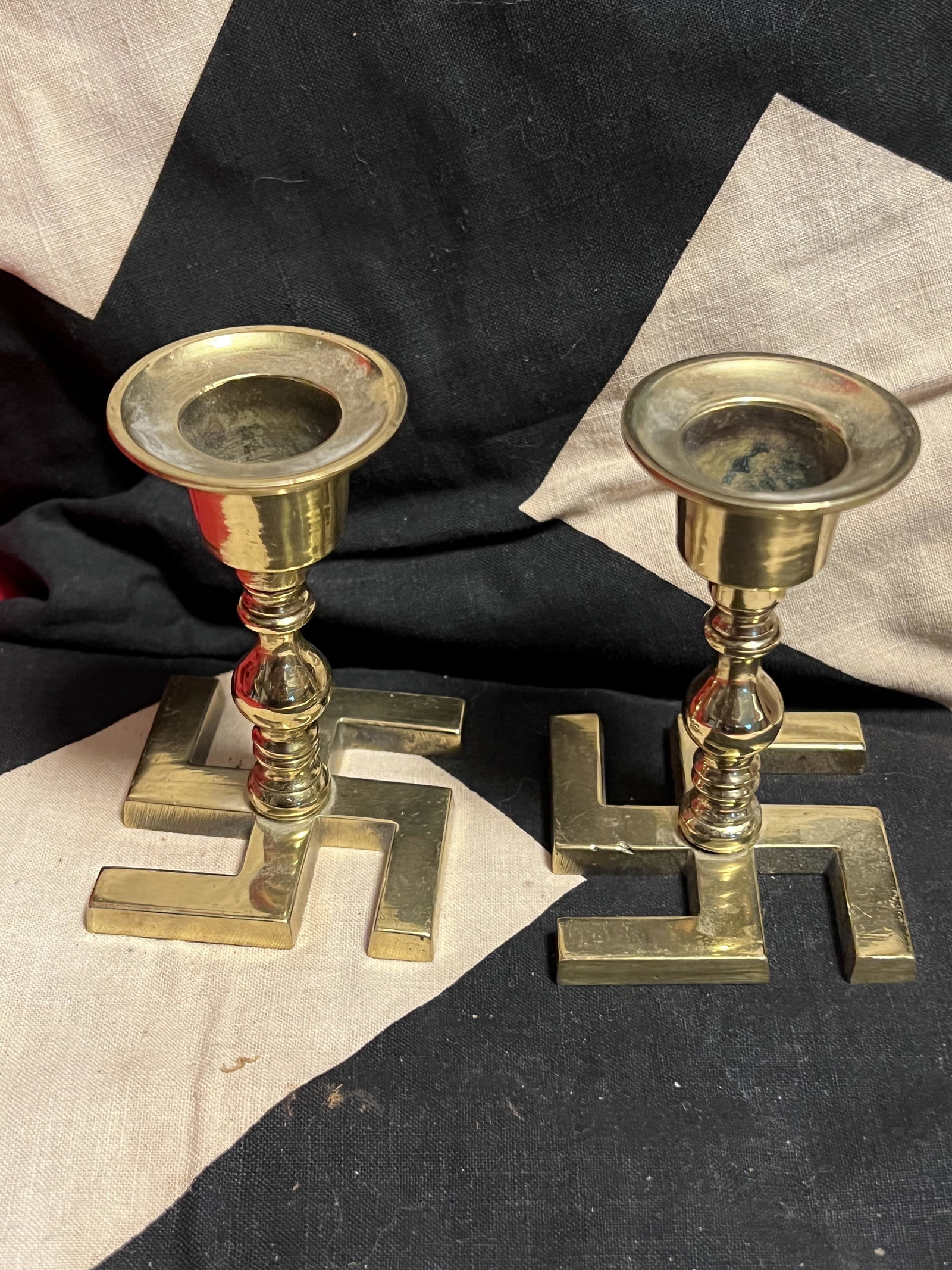 WW2 PAIR OF (2) GERMAN NAZI CANDLE STICK HOLDERS: WW2 PAIR OF (2) GERMAN NAZI CANDLE STICK HOLDERS. A RARE FIND. IT IS IN MINT OVERALL SHAPE AND CONDITION WITH A BEAUTIFUL OVERALL PATINA. A GREAT FIND AND AN EXCELLENT ADDITION TO YOUR COLLECTION.