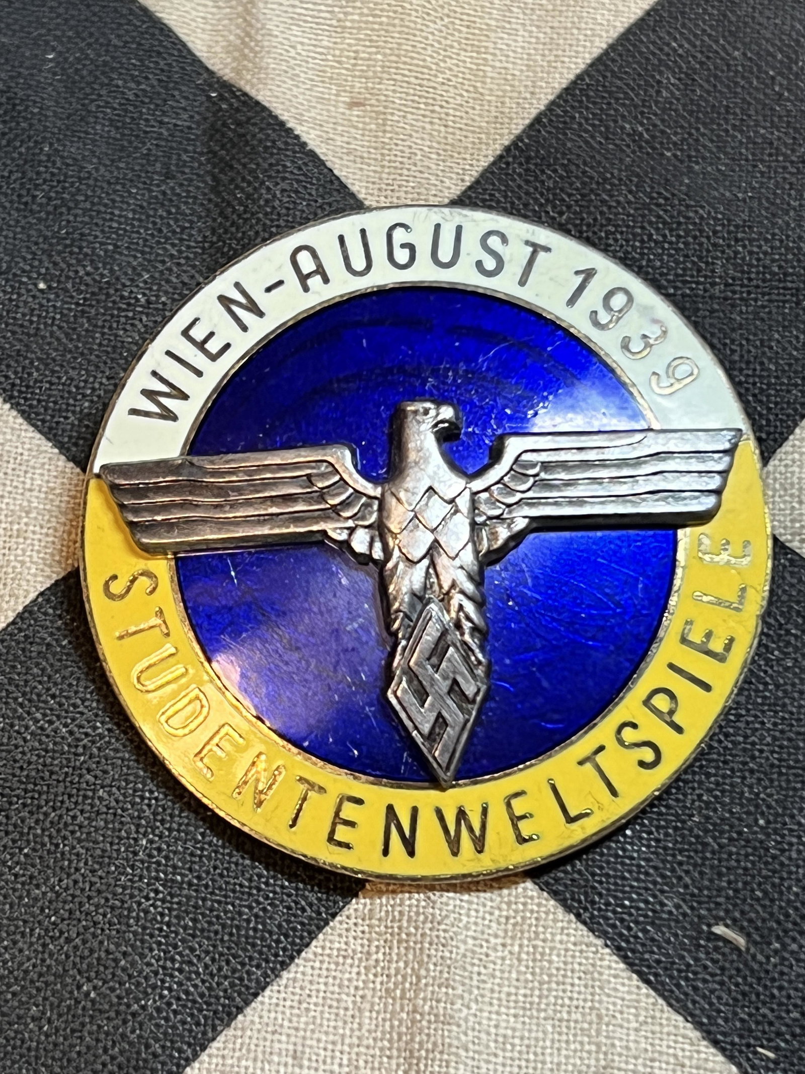 WW2 GERMAN WIEN-AUGUST 1939 HITLER YOUTH BADGE: WW2 GERMAN WIEN-AUGUST 1939 HITLER YOUTH BADGE. A RARE FIND. HAS THE MAKER MARKS ON THE BACK. IT IS IN MINT OVERALL SHAPE AND CONDITION WITH A BEAUTIFUL OVERALL PATINA. PLEASE VIEW ALL DETAILED PICTUR