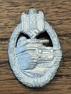 VET BRING BACK WW2 GERMAN TANK BADGE IN SILVER: VET BRING BACK WW2 GERMAN TANK BADGE IN SILVER. A RARE FIND. IT IS IN MINT OVERALL SHAPE AND CONDITION WITH A BEAUTIFUL OVERALL PATINA. HAS A GREAT LOOK TO IT WITH AN EXCELLENT OVERALL EYE APPEAL.