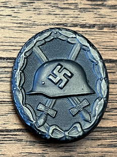 WW2 GERMAN WOUND BADGE IN BLACK: WW2 GERMAN WOUND BADGE IN BLACK. WAS BROUGHT BACK HOME BY A VET. A RARE FIND. A GREAT FIND AND AN EXCELLENT ADDITION TO YOUR COLLECTION.