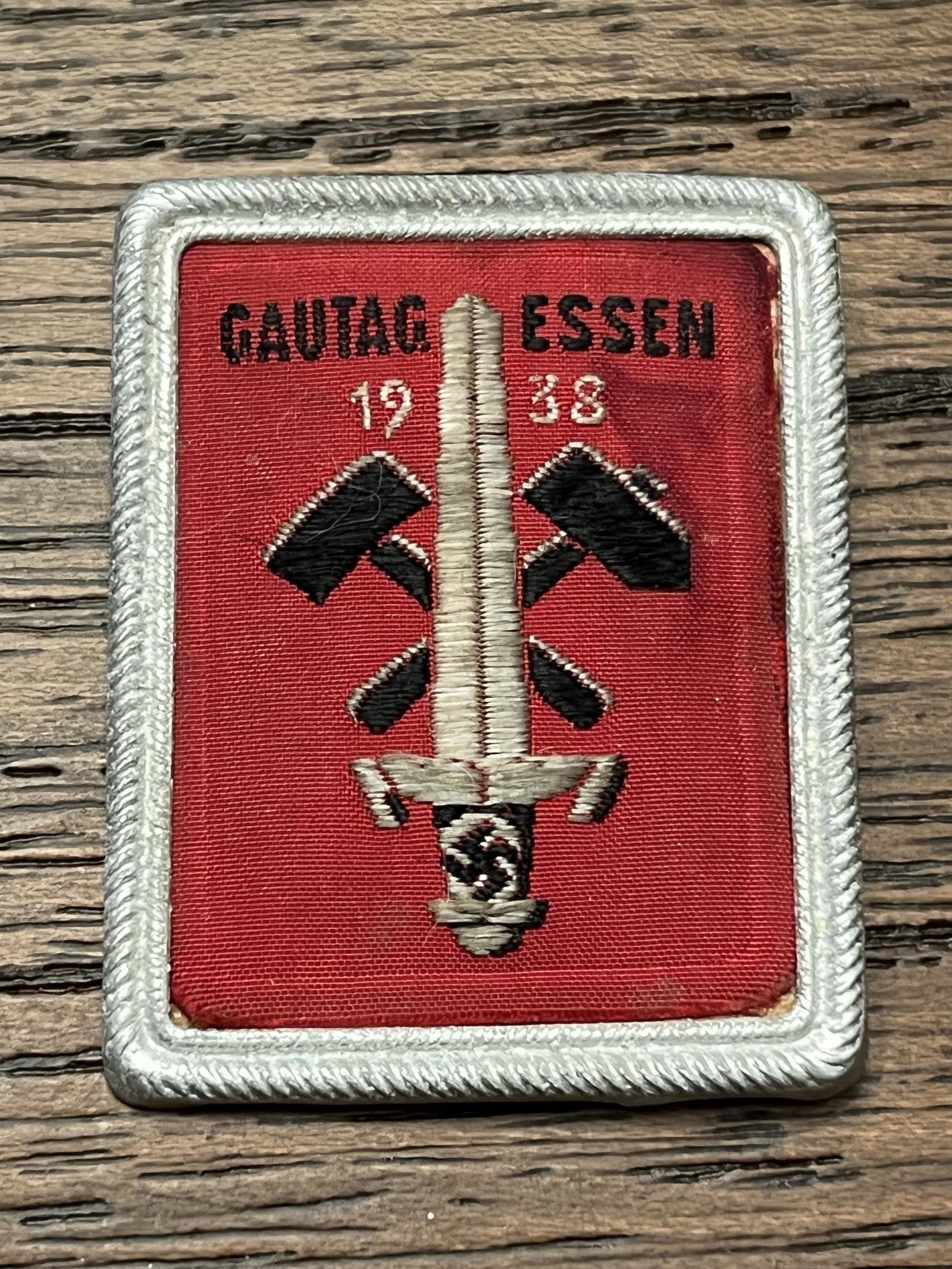 WW2 GERMAN GAUTAG ESSEN 1938 TINNIE W/MAKER MARKS: WW2 GERMAN GAUTAG ESSEN 1938 TINNIE W/MAKER MARKS. MAKER MARKED R. MORISSE & CO - ELBERFEL. A RARE FIND. IT IS IN MINT OVERALL SHAPE AND CONDITION WITH A BEAUTIFUL OVERALL PATINA. HAS A GREAT LOOK TO