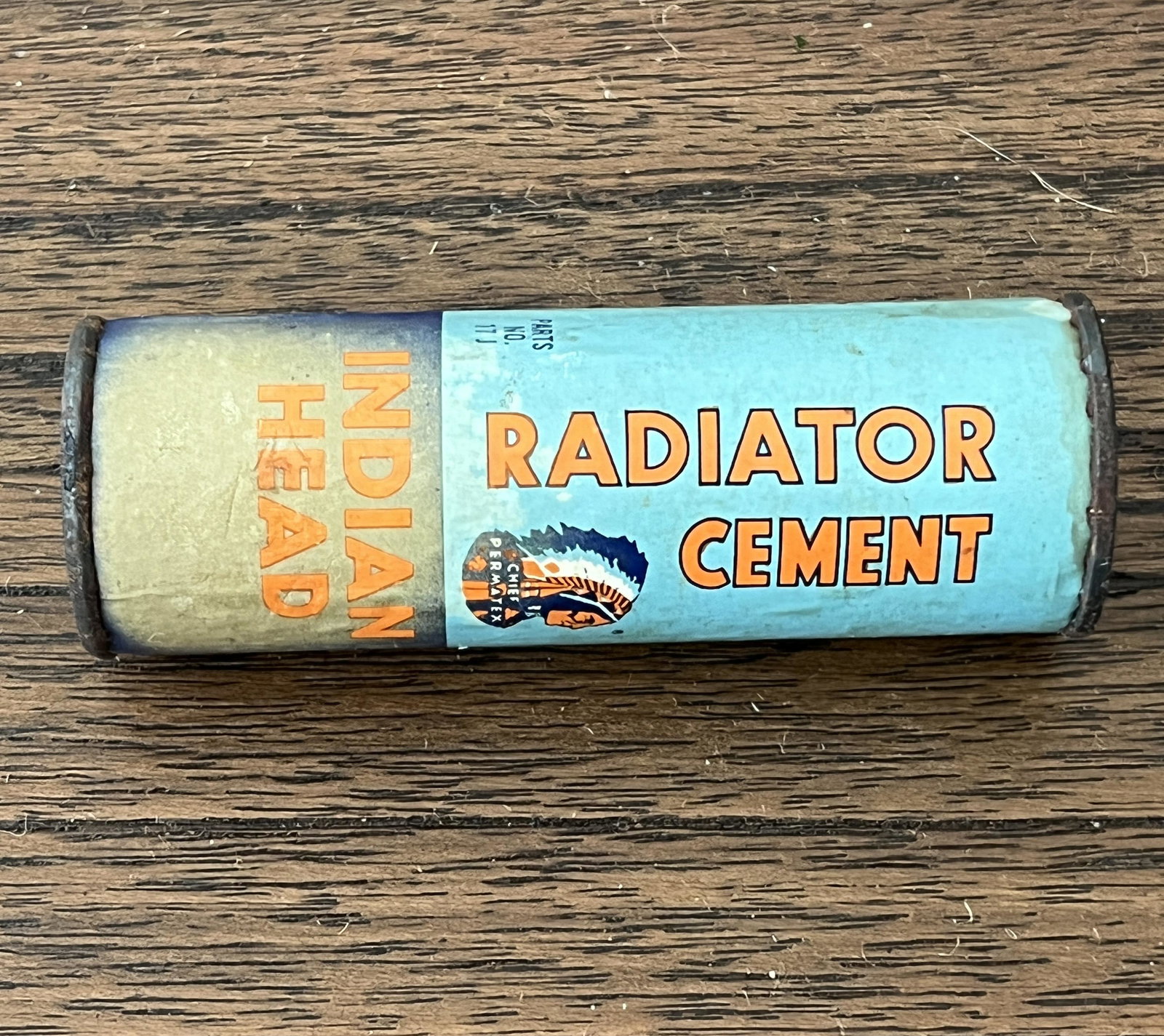 INDIAN HEAD RADIOR CEMENT TIN BOX CHIEF PERMATEX: INDIAN HEAD RADIOR CEMENT TIN BOX CHIEF PERMATEX. A RARE FIND. IT IS IN MINT OVERALL SHAPE AND CONDITION. A GREAT FIND AND AN EXCELLENT ADDITION TO YOUR COLLECTION.
