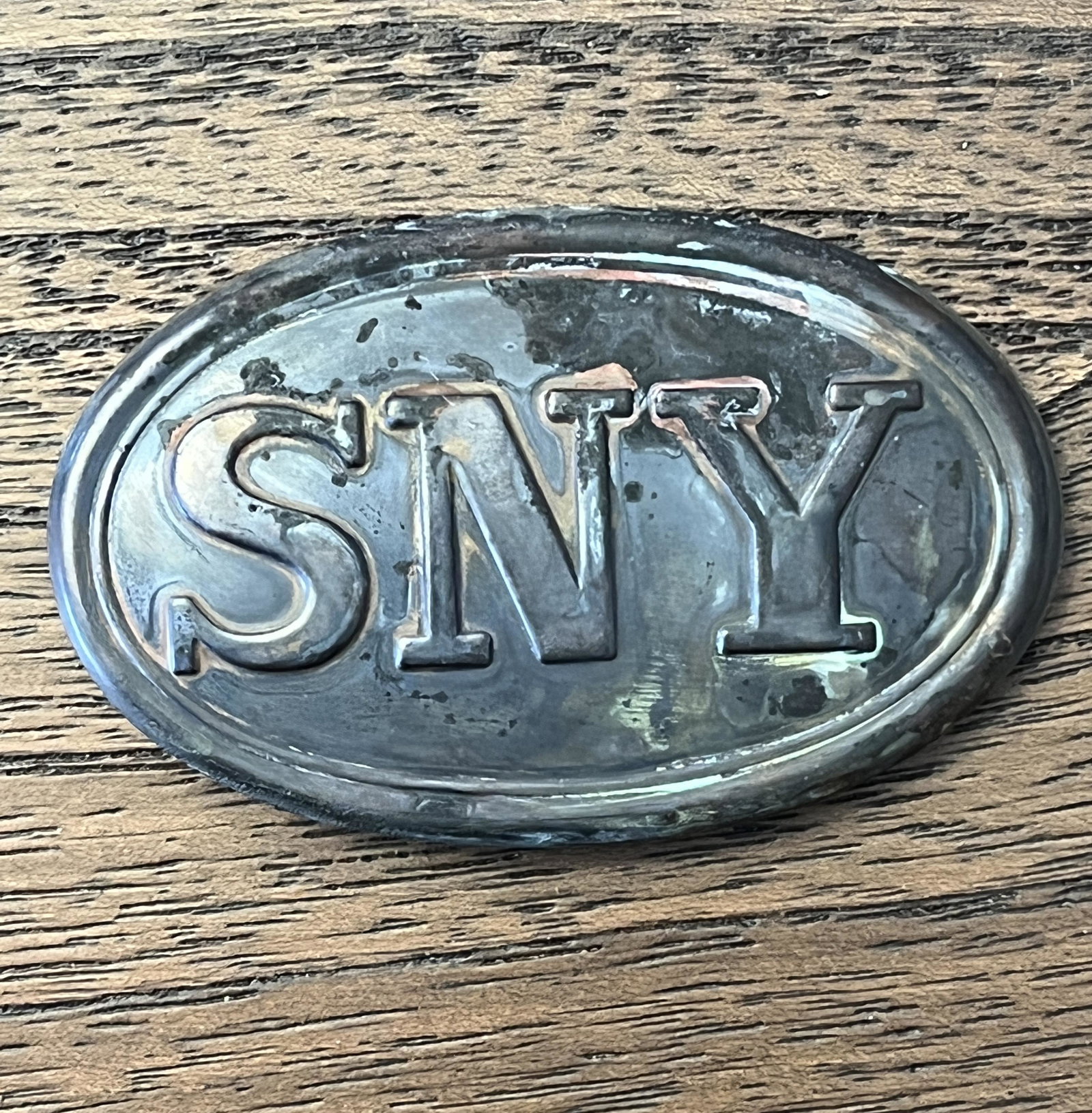 RARE CIVIL WAR SNY UNION BELT BUCKLE: RARE CIVIL WAR SNY UNION BELT BUCKLE. A RARE FIND. IT IS IN MINT OVERALL SHAPE AND CONDITION WITH A BEAUTIFUL OVERALL PATINA. PLEASE VIEW ALL DETAILED PICTURES. A GREAT FIN AND AN EXCELLENT ADDITION T