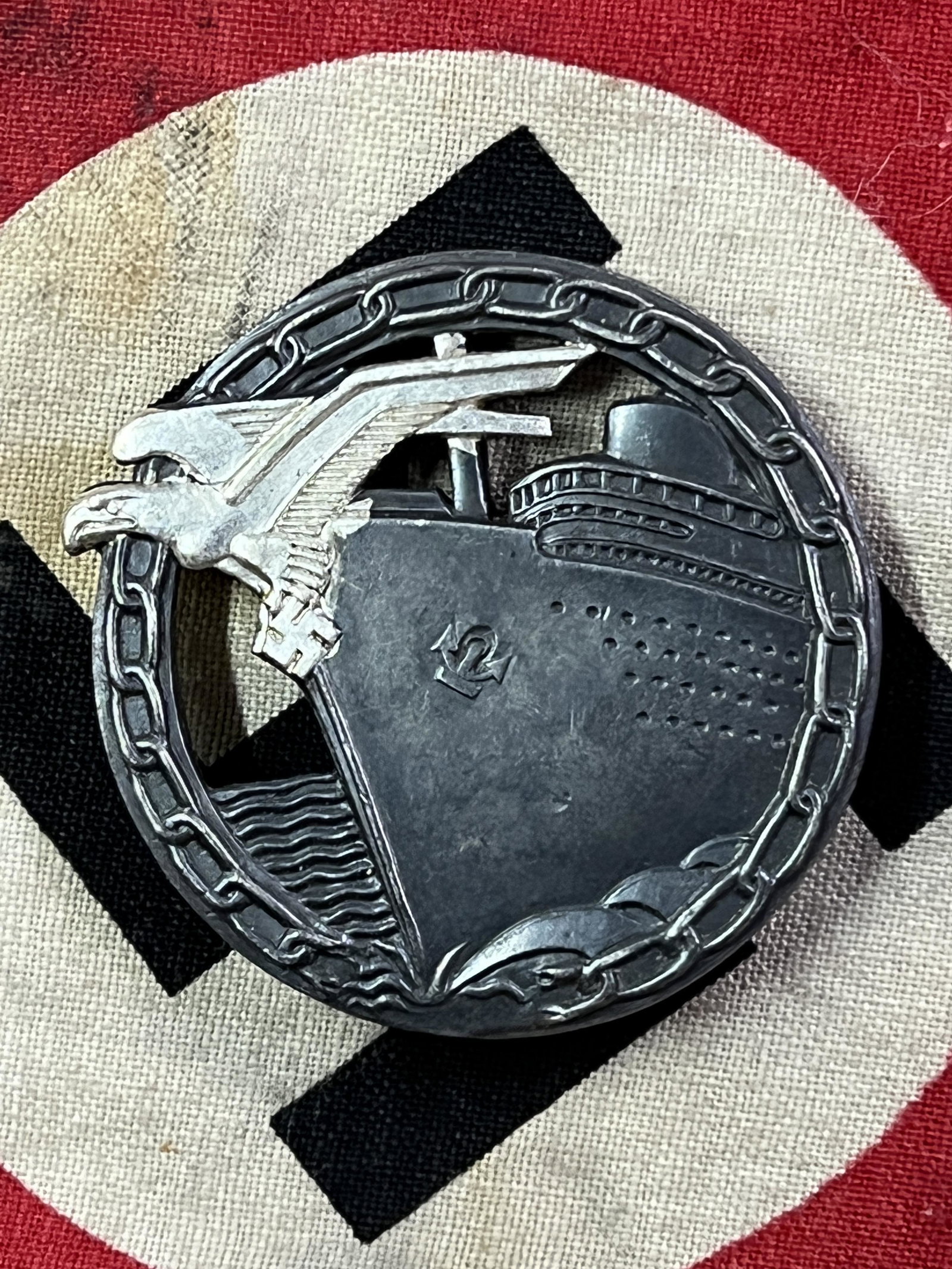 WW2 GERMAN BLOCKADE RUNNER BADGE BY FEC. OTTO PLACZEK: WW2 GERMAN BLOCKADE RUNNER BADGE BY FEC. OTTO PLACZEK. A RARE FIND. IT IS IN MINT OVERALL SHAPE AND CONDITION WITH A BEAUTIFUL OVERALL PATINA. HAS A GREAT LOOK TO IT WITH AN EXCELLENT OVERALL EYE APPE