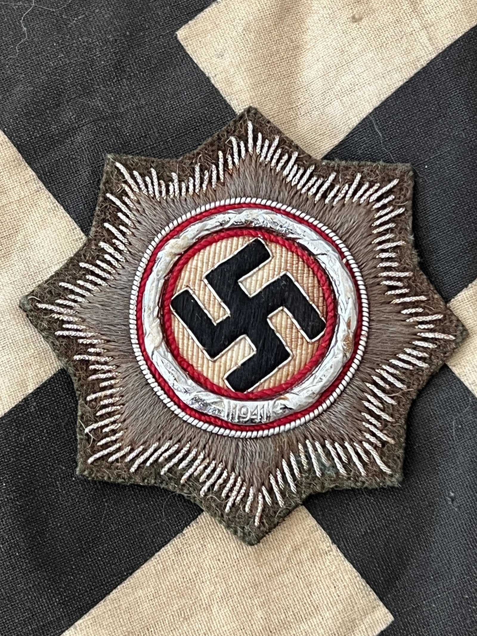 WW2 GERMAN NAZI HEER CROSS IN SILVER W/MAKER MARK TAG: WW2 GERMAN NAZI HEER CROSS IN SILVER W/MAKER MARK TAG. A RARE FIND. THIS CROSS IS IN SILVER. IN MINT OVERALL SHAPE AND CONDITION WITH A BEAUTIFUL OVERALL PATINA. HAS THE MAKER MARK TAG ON THE BACK. A 