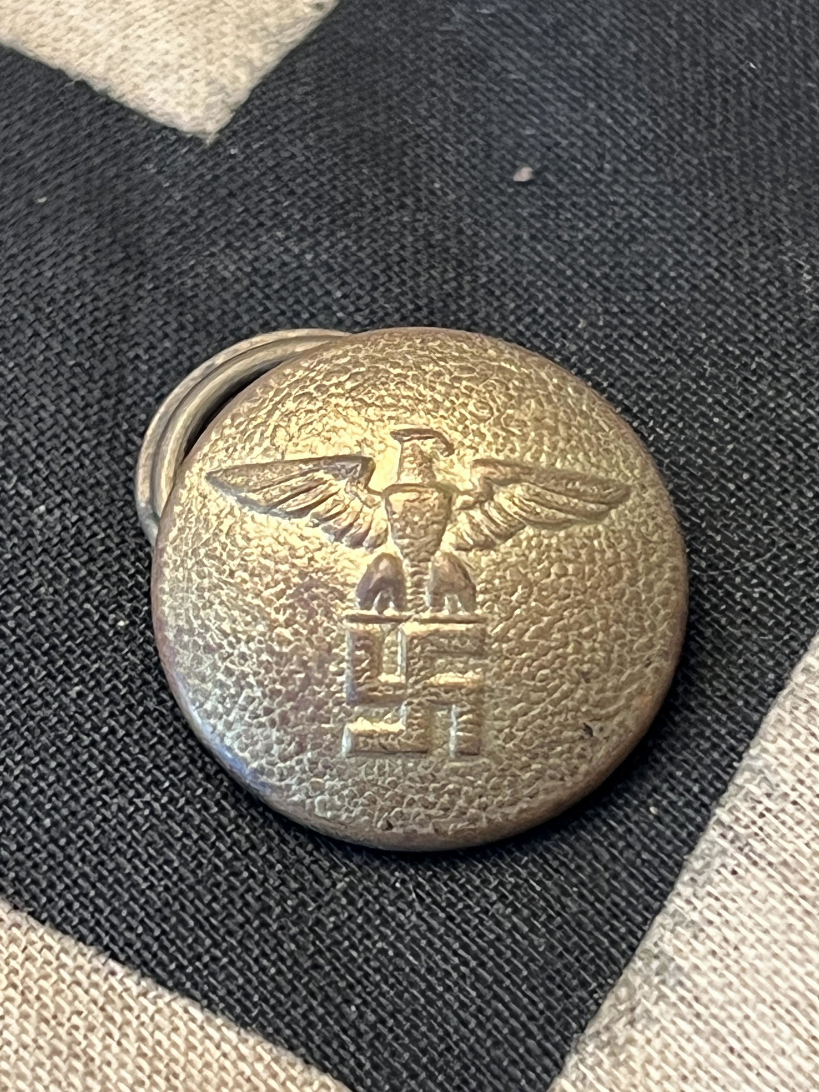 WW2 GERMAN UNIFORM BUTTON W/EAGLE & SWASTIKA: WW2 GERMAN UNIFORM BUTTON W/EAGLE & SWASTIKA. HAS THE MAKER MARKS ON THE BACK. IN GOOD OVERALL SHAPE AND CONDITION. PLEASE VIEW ALL DETAILED PICTURES. A GREAT FIND AND AN EXCELLENT ADDITION TO YOUR CO