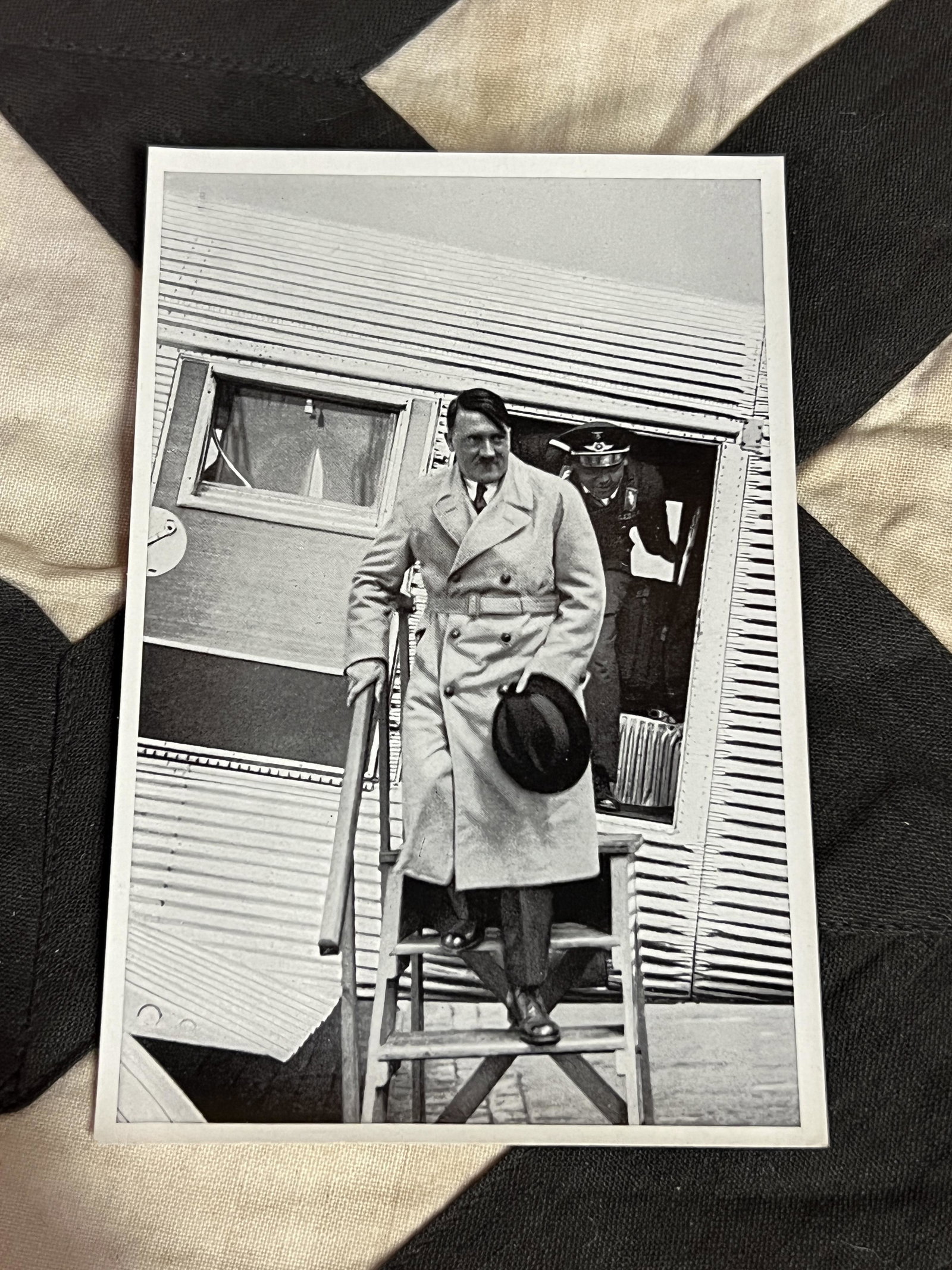 WW2 GERMAN ADOLF HITLER COMING OUT OF PLANE PHOTOGRAPH: WW2 GERMAN ADOLF HITLER COMING OUT OF PLANE PHOTOGRAPH. A RARE FIND. WAS BROUGHT BACK HOME BY A VET. A GREAT FIND AND AN EXCELLENT ADDITION TO YOUR COLLECTION.