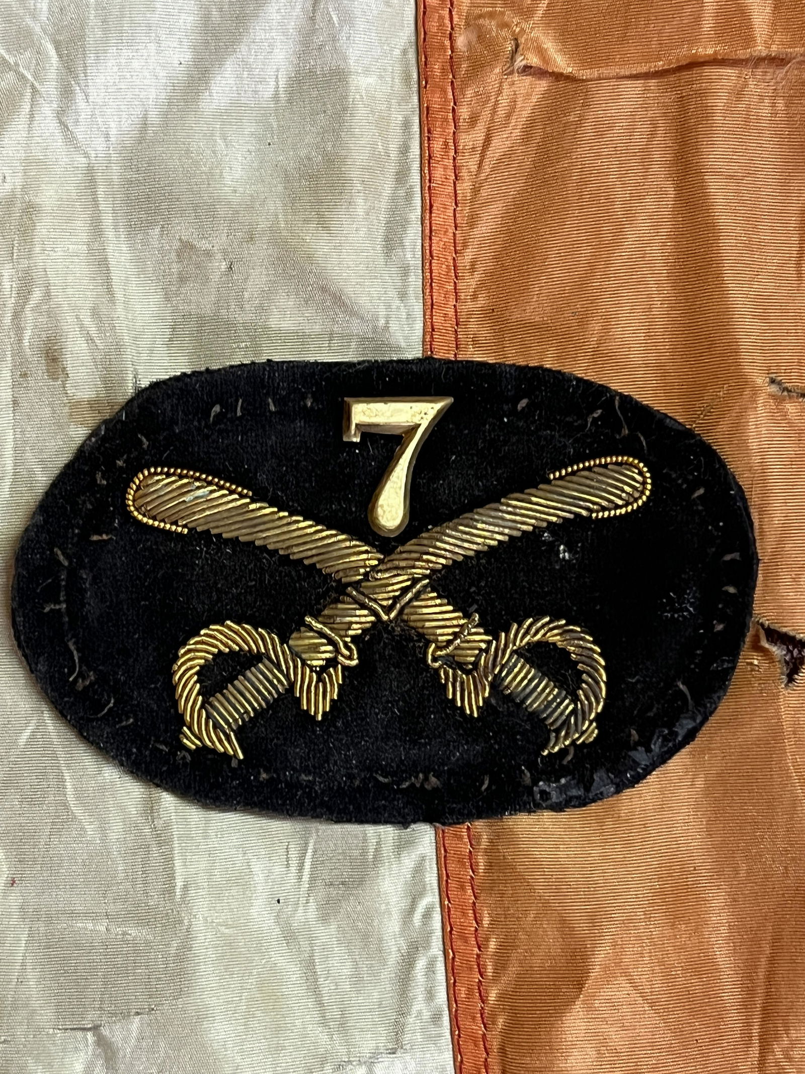 JOHN A. BAKER CIVIL WAR CAVALRY #7 HAT BADGE: JOHN A. BAKER CIVIL WAR CAVALRY #7 HAT BADGE. A RARE FIND. IT IS IN MINT OVERALL SHAPE AND CONDITION WITH A BEAUTIFUL OVERALL PATINA. HAS A GREAT LOOK TO IT WITH AN EXCELLENT OVERALL EYE APPEAL. A GRE