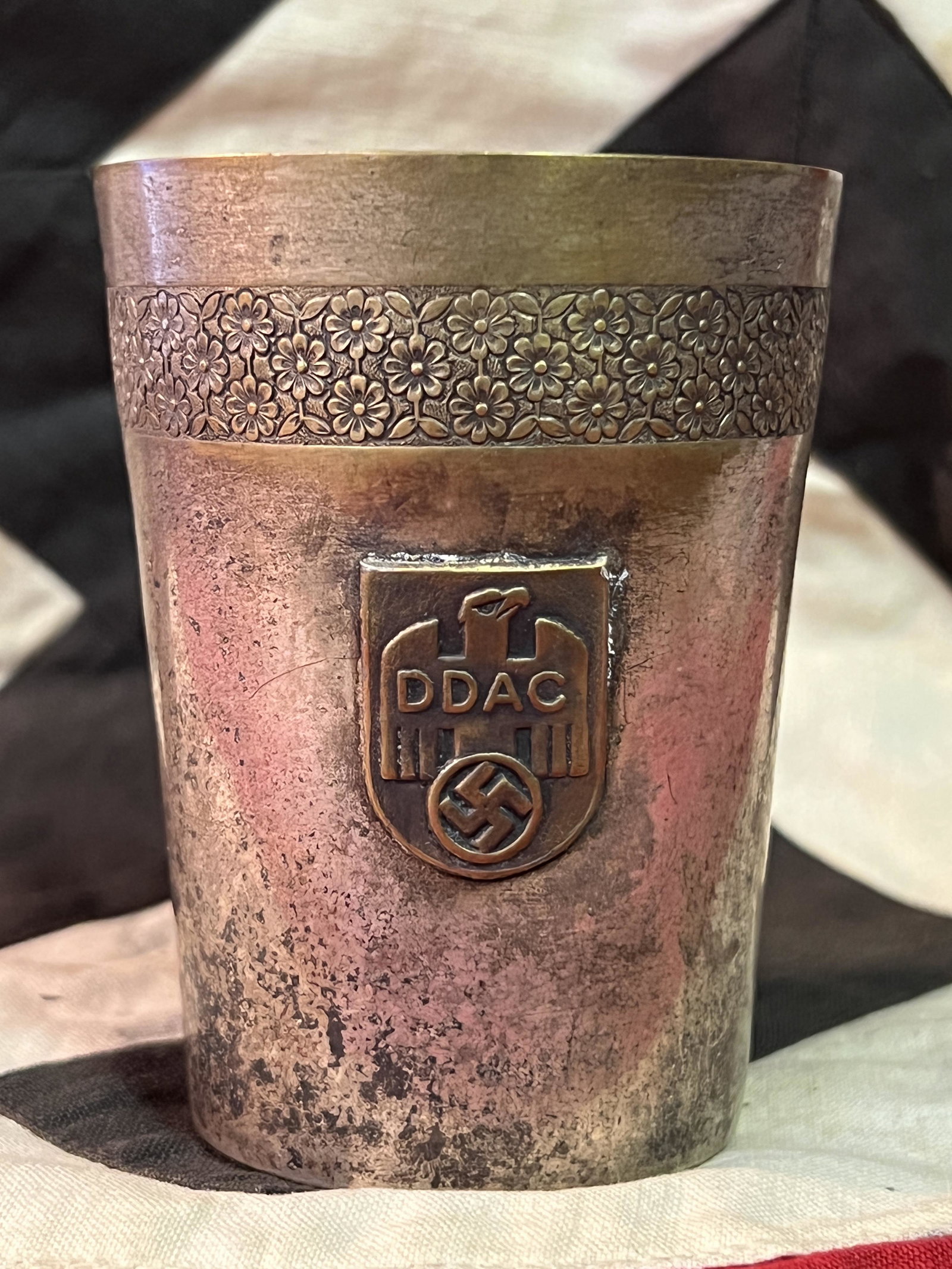 WW2 GERMAN DDAC OFFICER SILVER DECORATED GLASS: WW2 GERMAN DDAC OFFICER SILVER DECORATED GLASS. A RARE FIND. WAS BROUGHT BACK HOME BY A VET. HAS A GREAT LOOK TO IT WITH AN EXCELLENT OVERALL EYE APPEAL. PLEASE VIEW ALL DETAILED PICTURES. A GREAT FIN