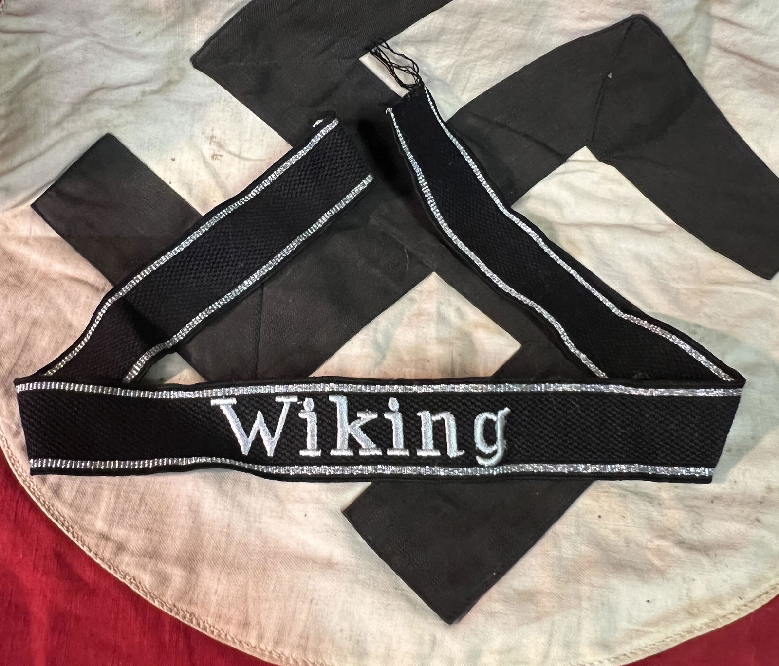 WW2 GERMAN WIKING CUFF TITLE: WW2 GERMAN WIKING CUFF TITLE. A RARE FIND. IT IS IN MINT OVERALL SHAPE AND CONDITION WITH A BEAUTIFUL OVERALL PATINA. A GREAT FIND AND AN EXCELLENT ADDITION TO YOUR COLLECTION.