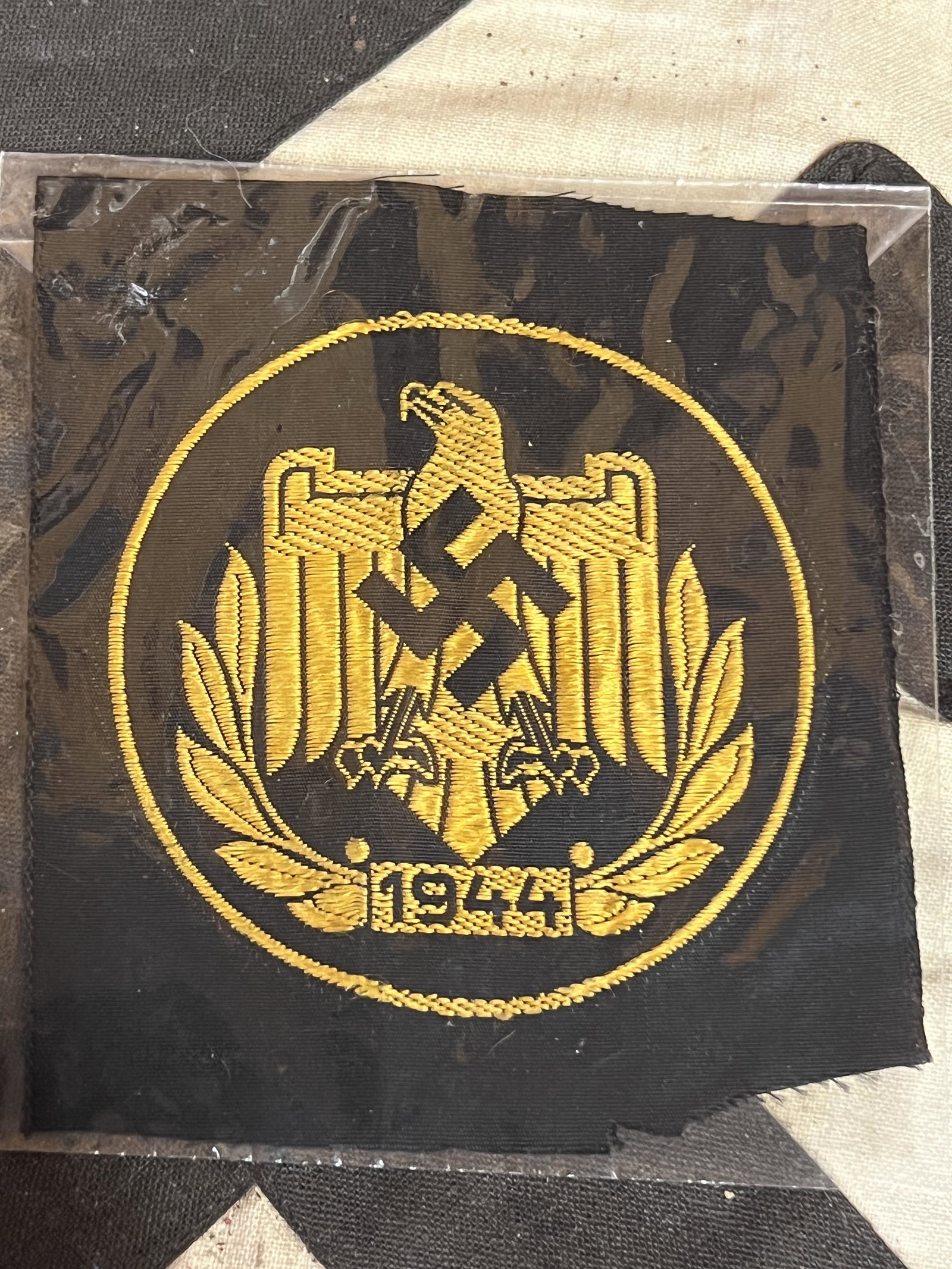 WW2 GERMAN NATIONAL SPORTS ASSN. SPORTING VEST EAGLE 1944: WW2 GERMAN NATIONAL SPORTS ASSN. SPORTING VEST EAGLE 1944. A RARE FIND. IT IS IN MINT OVERALL SHAPE AND CONDITION WITH A BEAUTIFUL OVERALL PATINA. HAS A GREAT LOOK TO IT WITH AN EXCELLENT OVERALL EYE 