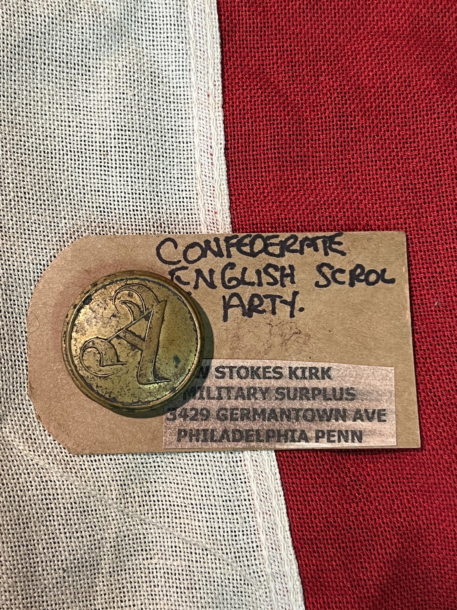CIVIL WAR CONFEDERATE ENGLISH SCROLL ARTILLERY BUTTON - W. STOKES KIRK: CIVIL WAR CONFEDERATE ENGLISH SCROLL ARTILLERY BUTTON - W. STOKES KIRK. A RARE FIND. IT IS IN MINT OVERALL SHAPE AND CONDITION WITH A BEAUTIFUL OVERALL PATINA. A GREAT FIND AND AN EXCELLENT ADDITION T