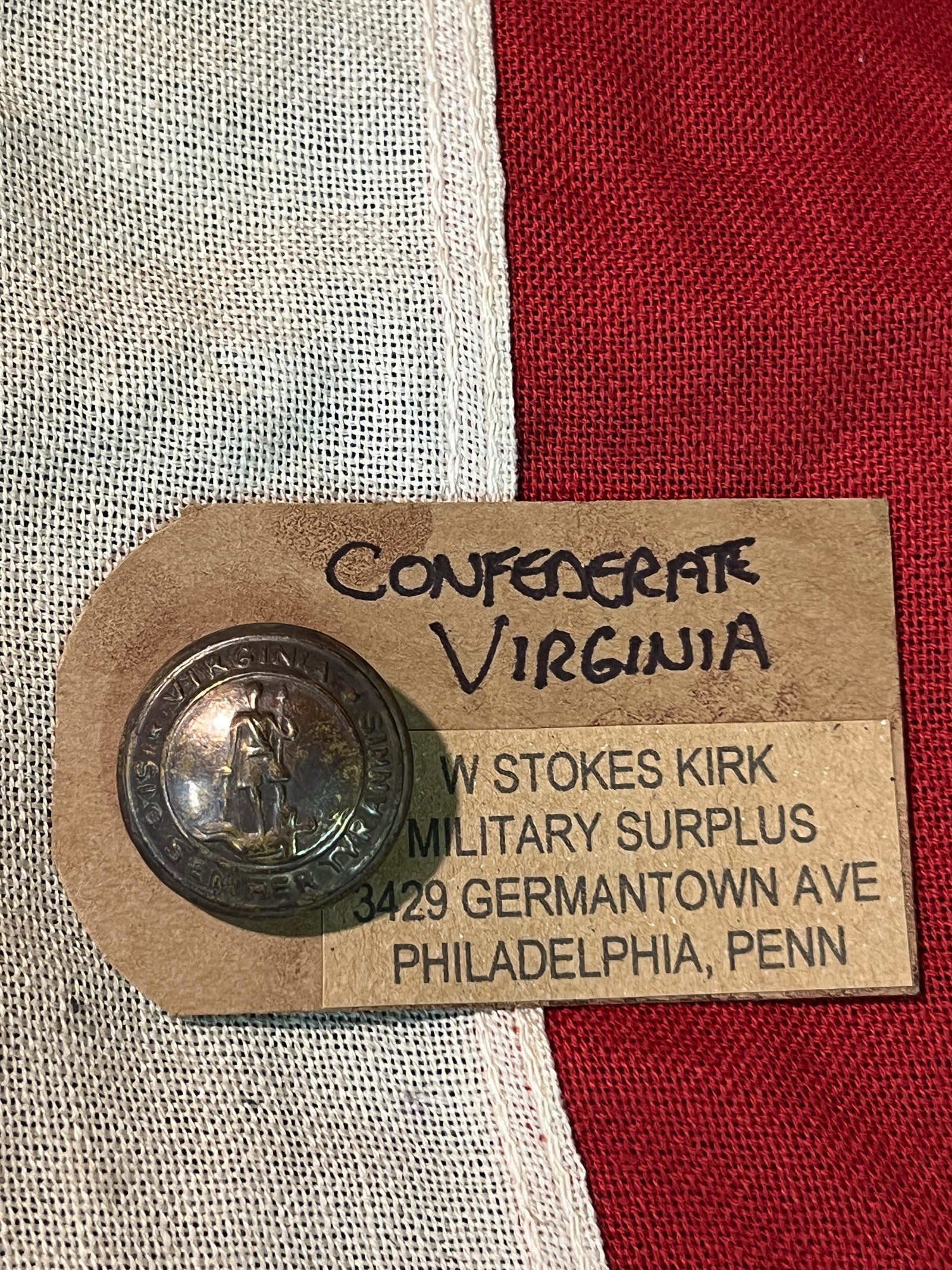 W. STOKES KIRK CIVIL WAR CONFEDERATE VIRGINIA BUTTON: W. STOKES KIRK CIVIL WAR CONFEDERATE VIRGINIA BUTTON. A RARE FIND. IT IS IN MINT OVERALL SHAPE AND CONDITION WITH A BEAUTIFUL OVERALL PATINA. COMES WITH THE ORIGINAL MAKER MARKS TAG ON IT. PLEASE VIEW