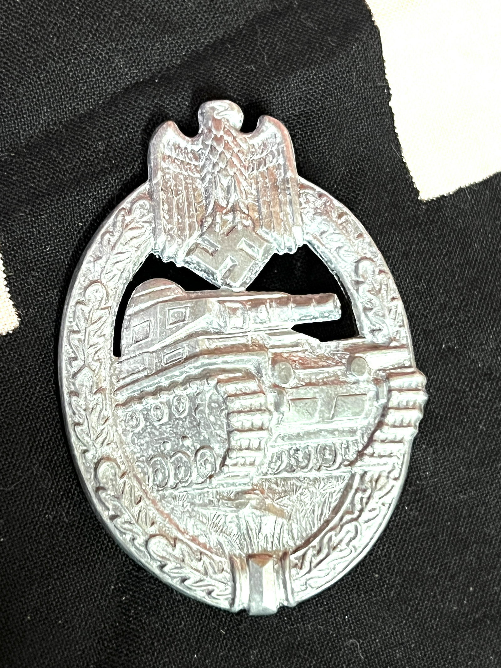 WW2 GERMAN PANZER TANK BADGE IN SILVER: WW2 GERMAN PANZER TANK BADGE IN SILVER. A RARE FIND. IT IS IN MINT OVERALL SHAPE AND CONDITION WITH A BEAUTIFUL OVERALL PAITNA. HAS A GREAT LOOK TO IT WITH AN EXCELLENT OVERALL EYE APPEAL. PLEASE VIEW