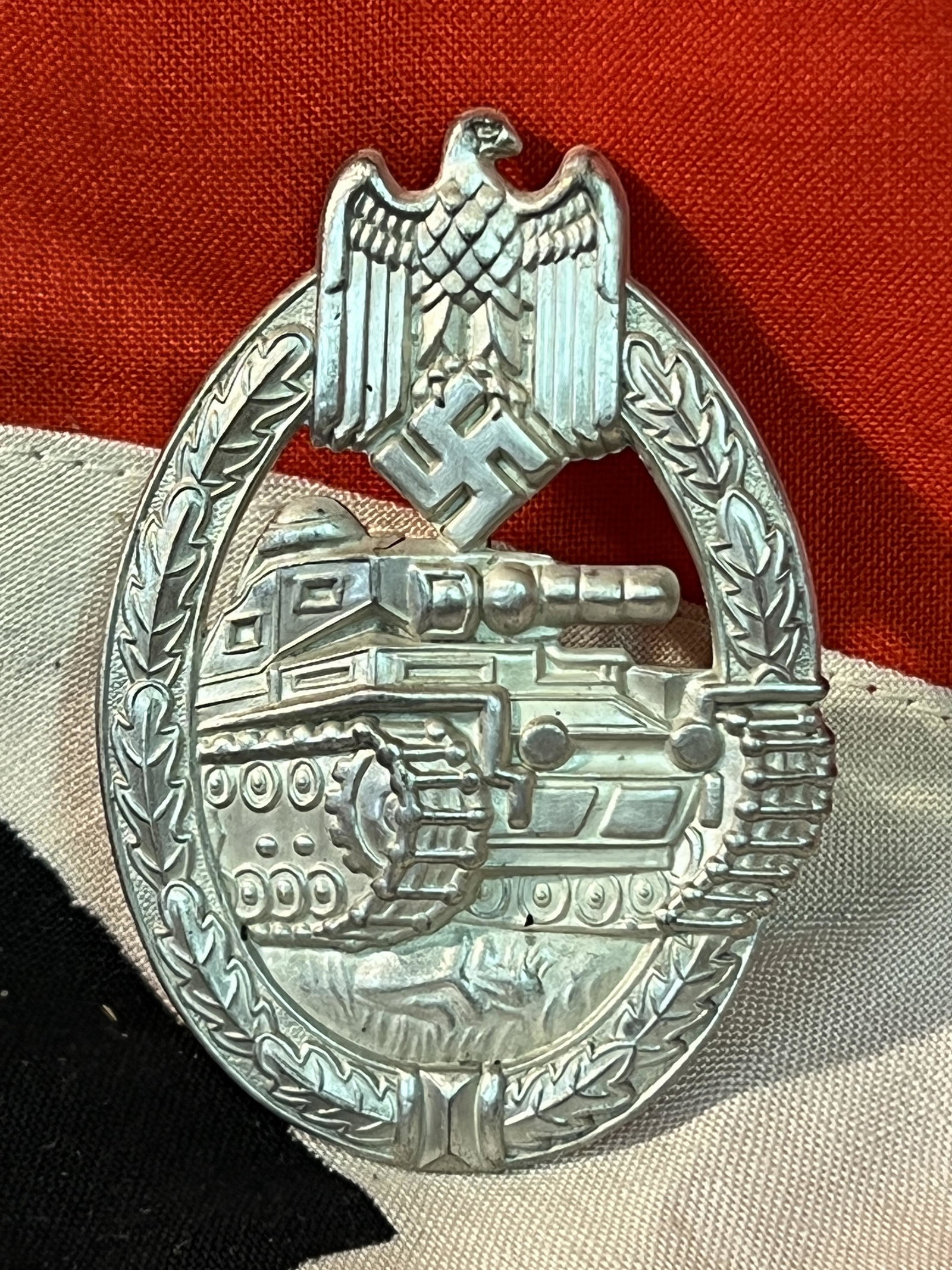 WW2 GERMAN NAZI PANZER TANK BADGE: WW2 GERMAN NAZI PANZER TANK BADGE. A RARE FIND. IT IS IN MINT OVERALL SHAPE AND CONDITION WITH A NICE OVERALL PATINA. SHOWS WEAR AND USE. A WELL CONSTRUCTED ARTIFACT. PLEASE VIEW ALL DETAILED PICTURES