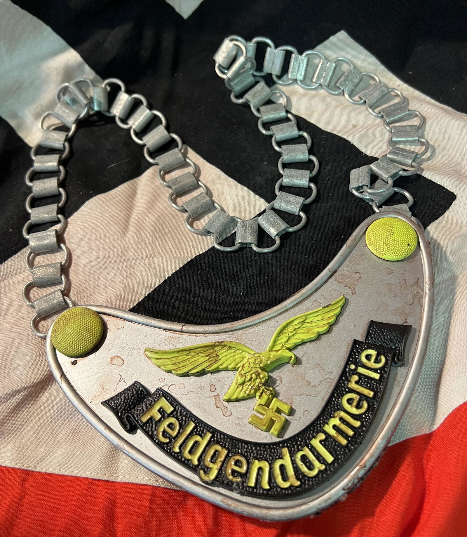 WW2 GERMAN LUFTWAFFE FELDGENDARMERIE GORGET: WW2 GERMAN LUFTWAFFE FELDGENDARMERIE GORGET. A RARE FIND. IT IS IN MINT OVERALL SHAPE AND CONDITION WITH A NICE OVERALL PATINA. SHOWS WEAR AND USE. A WELL CONSTRUCTED ARTIFACT. PLEASE VIEW ALL DETAILE