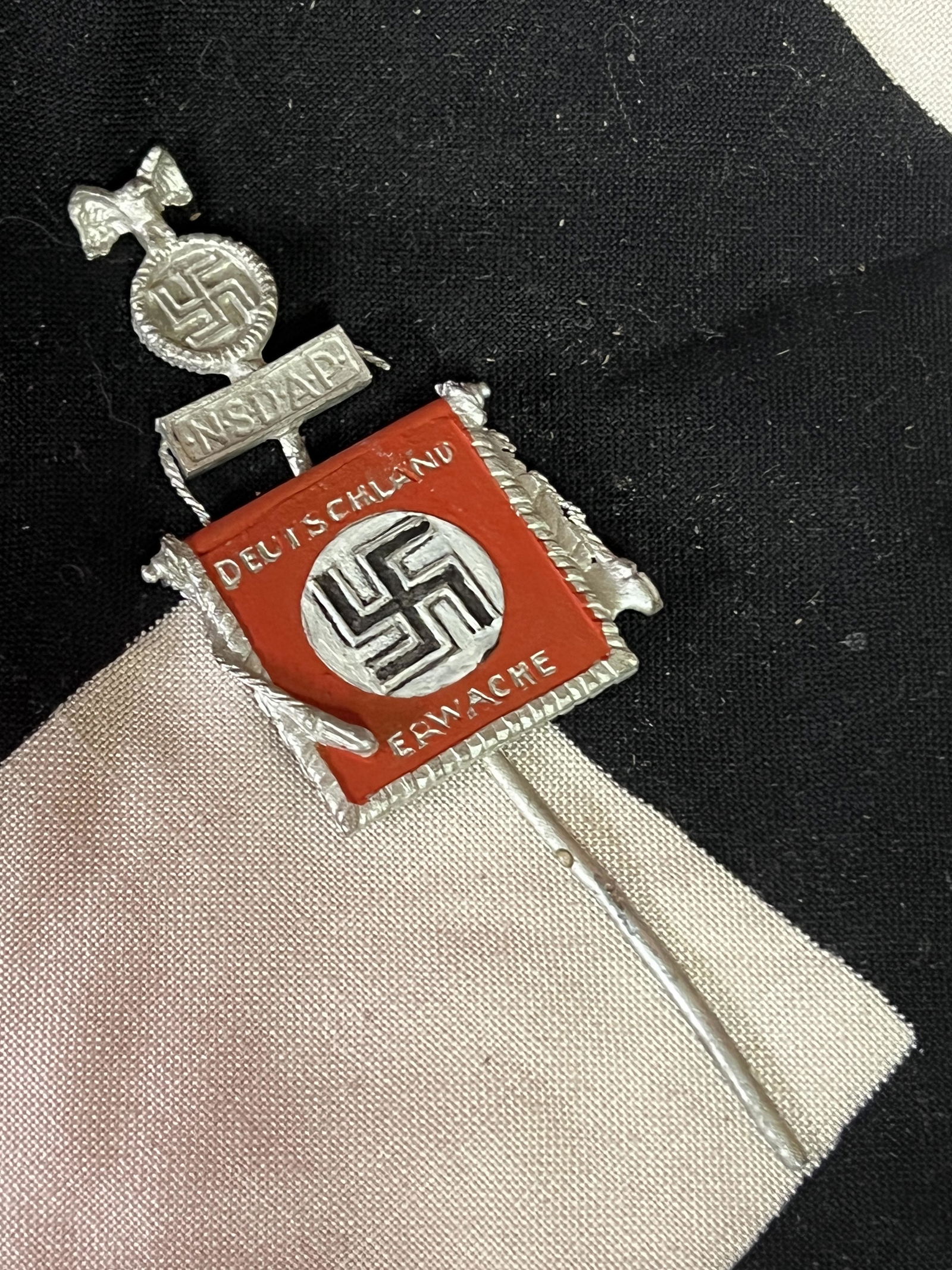 RARE WW2 GERMAN NSDAP DEUTSCHLAND ERWACHE MINIATURE FLAG: RARE WW2 GERMAN NSDAP DEUTSCHLAND ERWACHE MINIATURE FLAG. A RARE FIND. IT IS IN MINT OVERALL SHAPE AND CONDITION WITH A NICE PATINA THROUGHOUT. PLEASE VIEW ALL DETAILED PICTURES. A WELL MADE ANTIQUE G