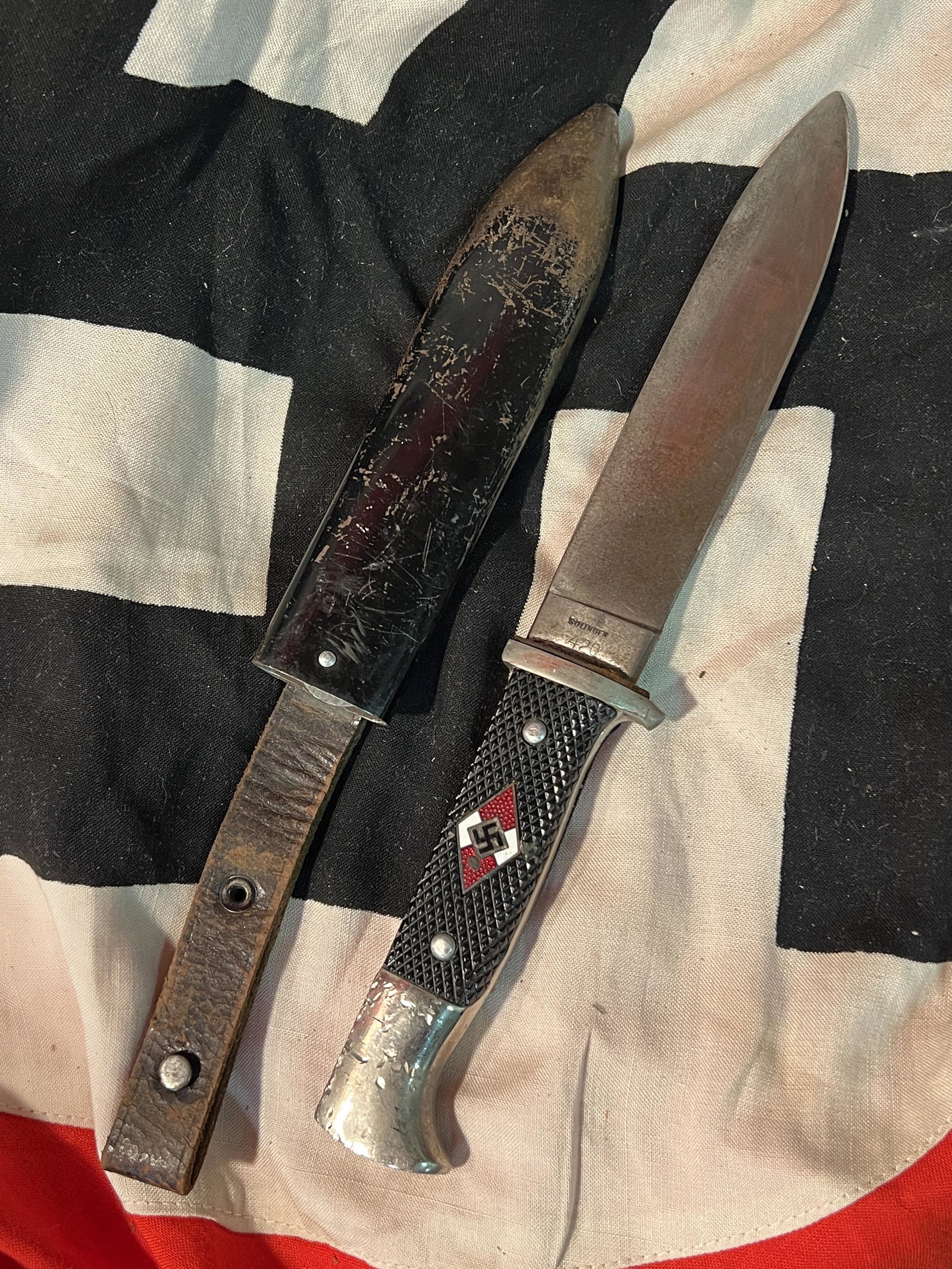 WW2 GERMAN HITLER YOUTH DAGGER - G.C. CO. GERMANY: WW2 GERMAN HITLER YOUTH DAGGER - G.C. CO. GERMANY. A RARE FIND WITH THE MAKER MARKS ON THE BLADE. SHOWS GOOD USE AND EVEN WEAR THROUGHOUT. COMES WITH THE ORIGINAL SCABBARD. THE BLADE IS STILL MINT. PL