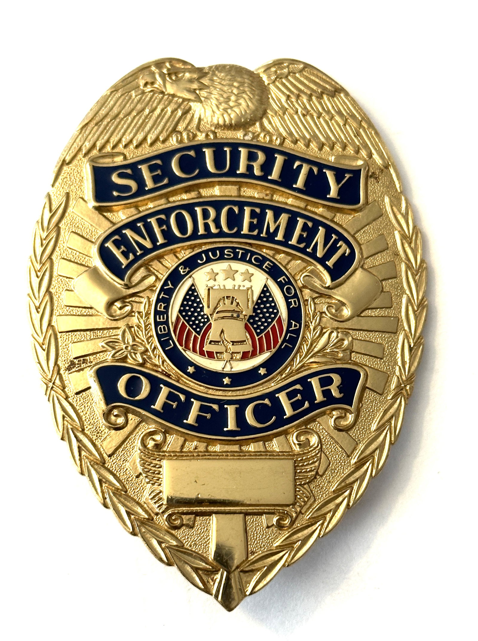 VINTAGE SECURITY ENFORCEMENT OFFICER BADGE: VINTAGE SECURITY ENFORCEMENT OFFICER BADGE. IN GOOD SHAPE AND CONDITION. A GREAT FIND.