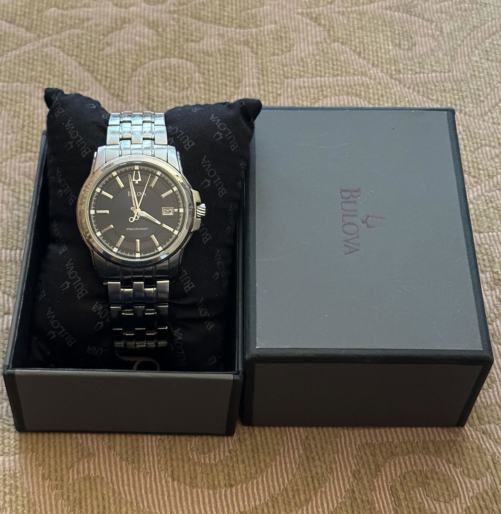 BULOVA PRECISIONIST MENS WRISTWATCH IN BOX: BULOVA PRECISIONIST MENS WRISTWATCH IN BOX. IN MINT OVERALL SHAPE AND CONDITION. PLEASE VIEW ALL DETAILED PICTURES. A GREAT FIND AND AN EXCELLENT ADDITION TO YOUR COLLECTION.