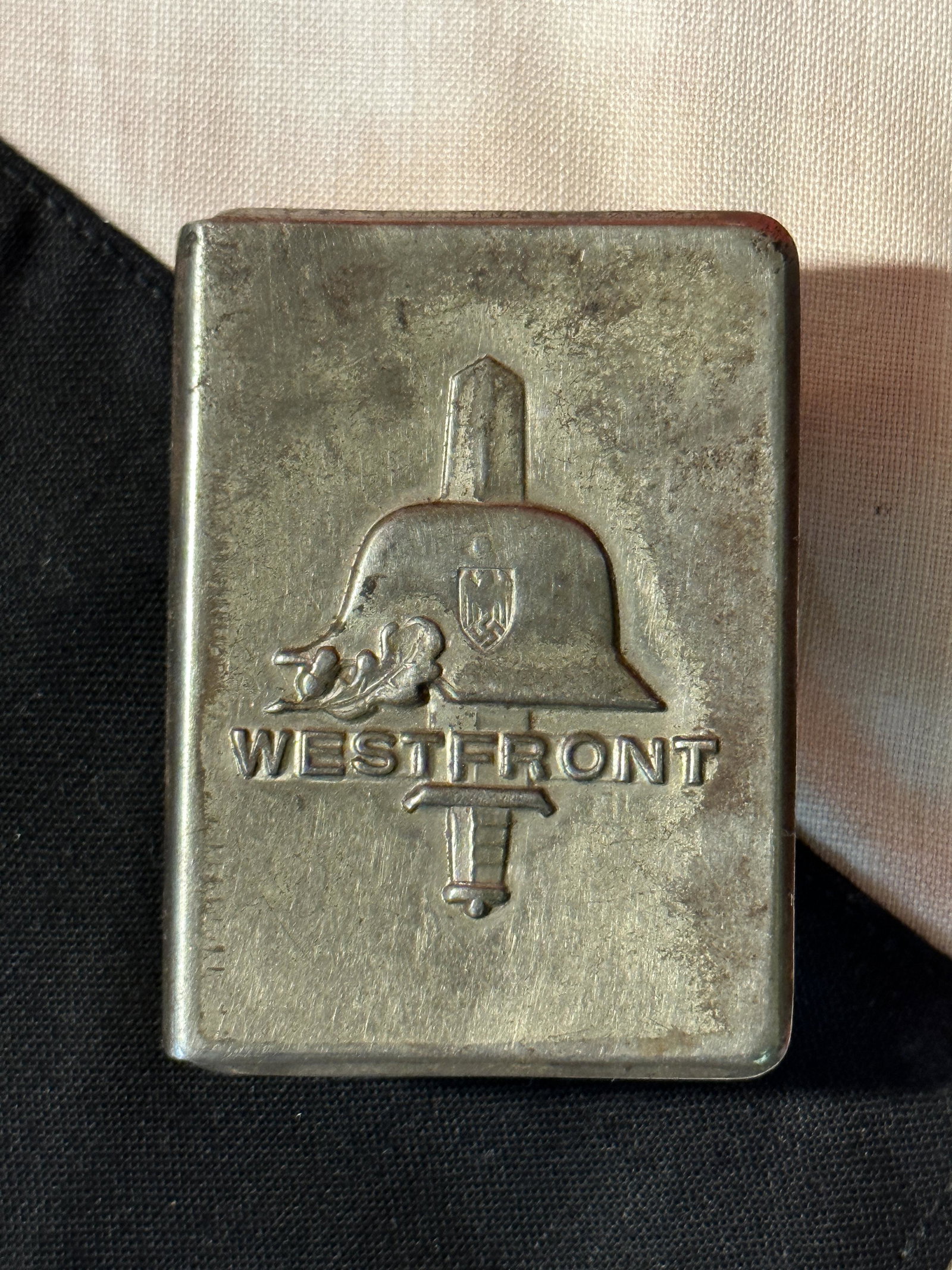 WW2 GERMAN WESTFRONT MATCHBOX CASE: WW2 GERMAN WESTFRONT MATCHBOX CASE. A RARE FIND. IT IS IN GOOD SHAPE AND OVERALL CONDITION WITH A NICE PATINA THROUGHOUT. PLEASE VIEW ALL DETAILED PICTURES. A WELL MADE ANTIQUE GERMAN ARTIFACT.