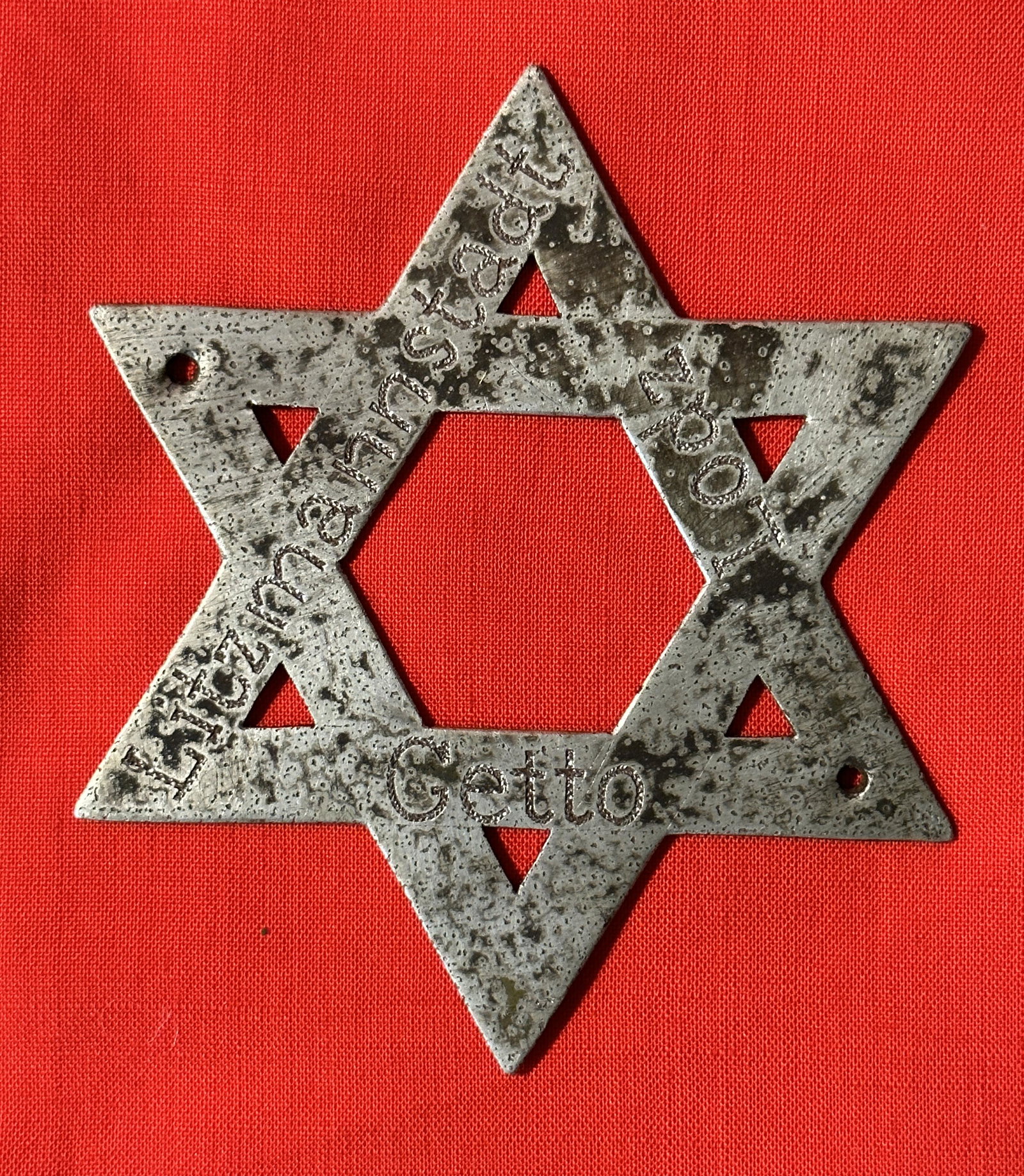 WW2 GERMAN CONCENTRATION CAMP STAR - LITZMANNSTADT LODZ GETTO: WW2 GERMAN CONCENTRATION CAMP STAR - LITZMANNSTADT LODZ GETTO. A VERY RARE FIND. HAS A NICE PATINA THROUGHOUT. APPEARS TO BE HEAVILY USED. HERE IS SOME HISTORY ON THE CAMP - "In the summer of 1944, se