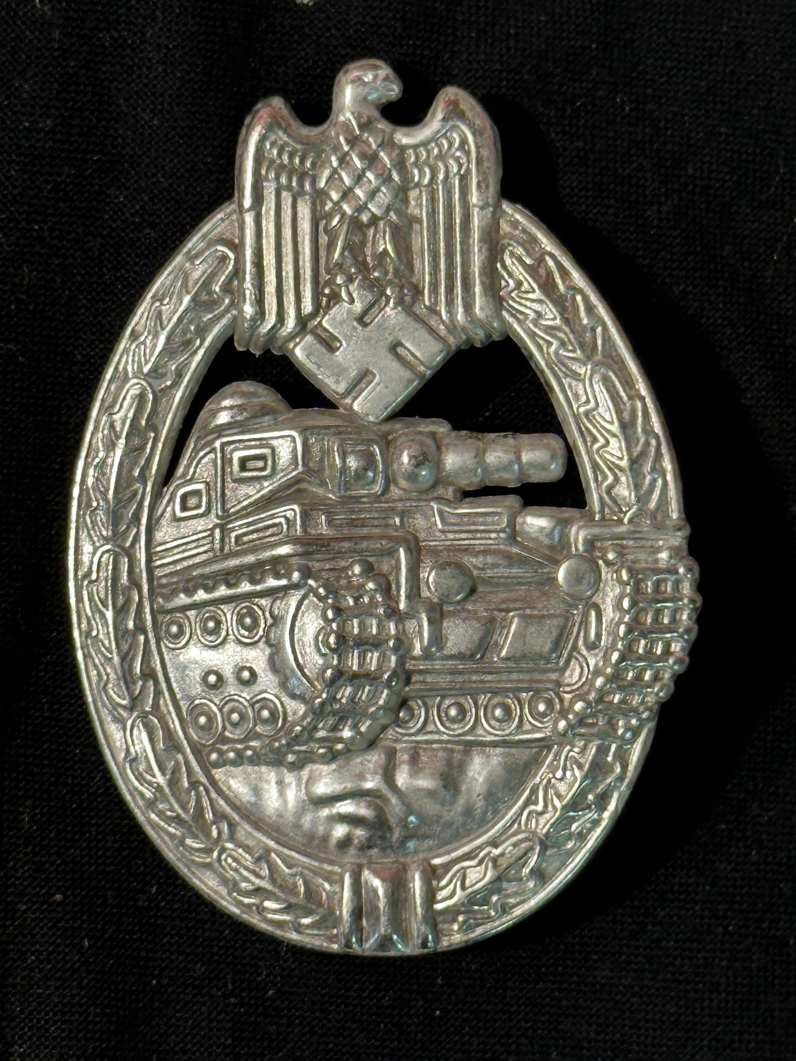RARE WW2 GERMAN PANZER TANK BADGE: RARE WW2 GERMAN PANZER TANK BADGE. IT IS IN MINT OVERALL SHAPE AND CONDITION WITH A NICE PATINA THROUGHOUT. PLEASE VIEW ALL DETAILED PICTURES. A WELL MADE ANTIQUE GERMAN ARTIFACT.