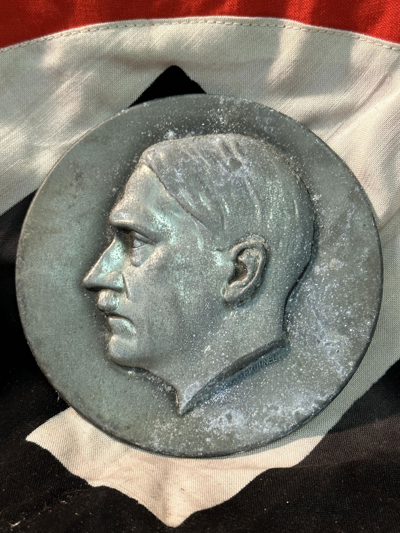 WW2 GERMAN ADOLF HITLER BUILDING WALL PLAQUE: WW2 GERMAN ADOLF HITLER BUILDING WALL PLAQUE. A RARE FIND. WAS BROUGHT BACK HOME BY A VET. IT IS IN GOOD SHAPE AND CONDITION WITH A NICE PATINA THROUGHOUT. A WELL MADE ANTIQUE GERMAN ARTIFACT.