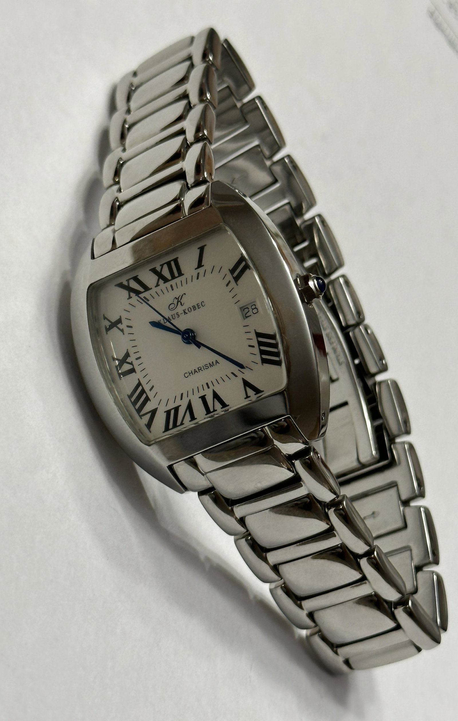 CARTIER HOMAGE KLAUS KOBEC CHARISMA UNISEX WRISWATCH: CARTIER HOMAGE KLAUS KOBEC CHARISMA UNISEX WRISWATCH. IN MINT OVERALL SHAPE AND CONDITION. RUNNING AND KEEPING GREAT TIME. PLEASE VIEW ALL DETAILED PICTURES. A GREAT FIND AND AN EXCELLENT ADDITION TO 