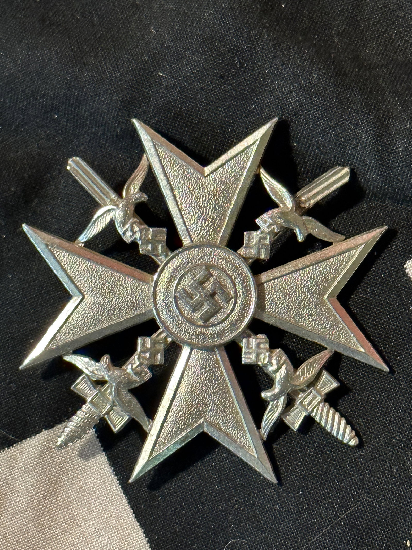 RARE WW2 GERMAN SPANISH CROSS WITH SWORDS IN SILVER: RARE WW2 GERMAN SPANISH CROSS WITH SWORDS IN SILVER. IT IS IN MINT OVERALL SHAPE AND CONDITION WITH A NICE PATINA THROUGHOUT. PLEASE VIEW ALL DETAILED PICTURES. A WELL MADE ANTIQUE GERMAN ARTIFACT.