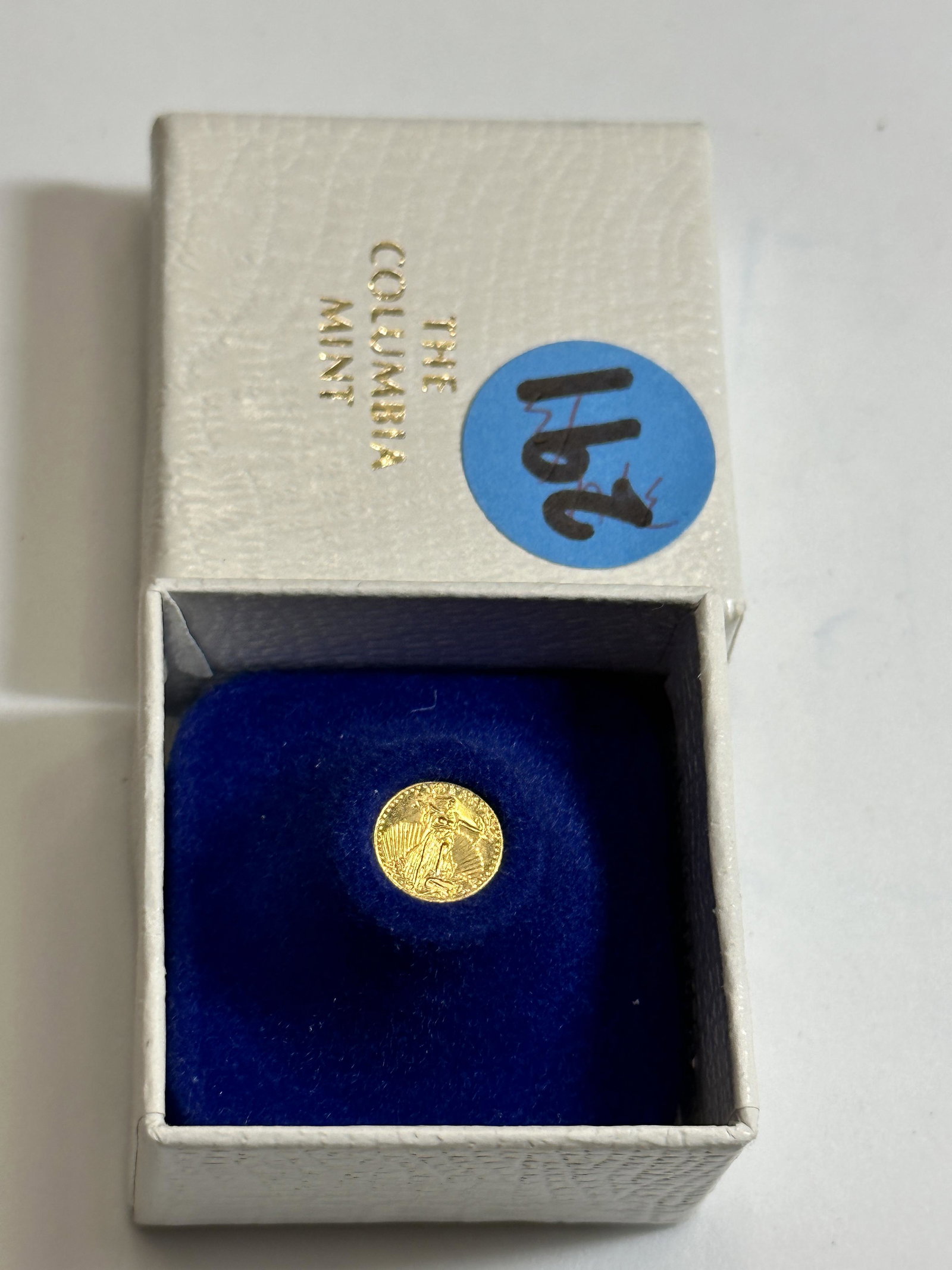 1908 WALKING LIBERTY MINIATURE GOLD COIN BY THE COLUMBIA MINT: 1908 WALKING LIBERTY MINIATURE GOLD COIN BY THE COLUMBIA MINT. A RARE FIND. IN MINT OVERALL SHAPE AND CONDITION. COMES IN THE ORIGINAL BOXC/CASE. A GREAT FIND AND AN EXCELLENT ADDITION TO YOUR COLLECT