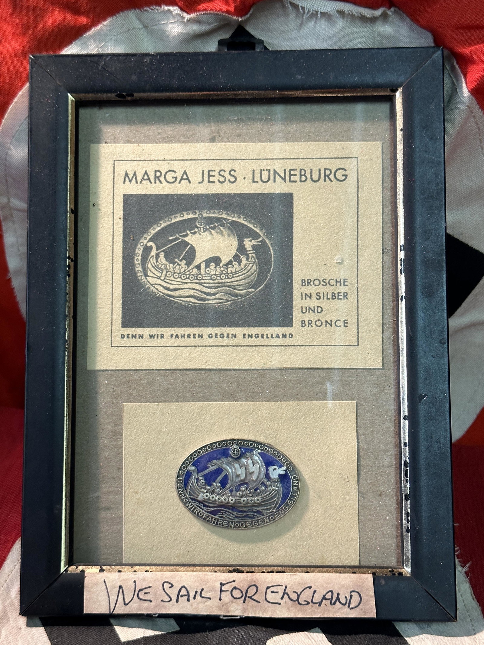 WW2 GERMAN ALLIED TROOPS "WE SAIL FOR ENGLAND" FRAMED BADGE: WW2 GERMAN ALLIED TROOPS "WE SAIL FOR ENGLAND" FRAMED BADGE. IT IS IN MINT OVERALL SHAPE AND CONDITION WITH A BEAUTIFUL OVERALL PATINA. SHOWS GOOD WEAR AND USE. PLEASE VIEW ALL DETAILED PICTURES. A WE